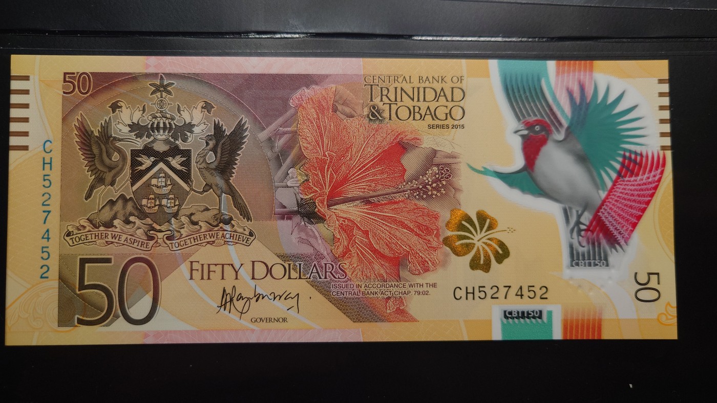 【世界钱币】精选微拍第98期暨2024年第9期  2015年特立尼达和多巴哥50 塑料钞 全新绝品尾号452