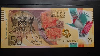【世界钱币】精选微拍第98期暨2024年第9期  2015年特立尼达和多巴哥50 塑料钞 全新绝品尾号452