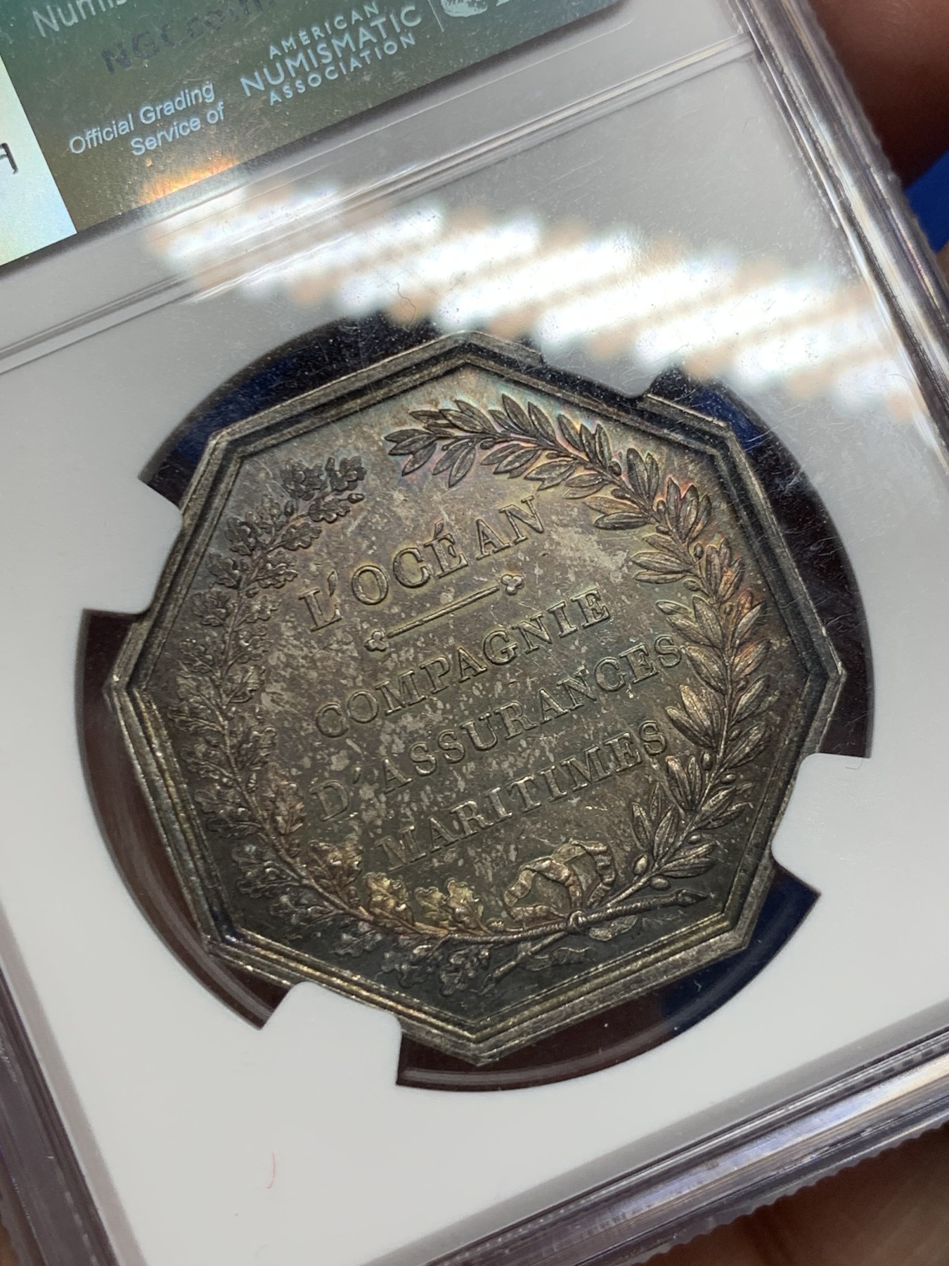 《竞宝斋》第250场-周日，周一 ，周二3场连拍 (全场包邮) NGC-MS62 法国JETON银质八角，海洋保险公司，名誉品海王，非常漂亮的彩色包浆