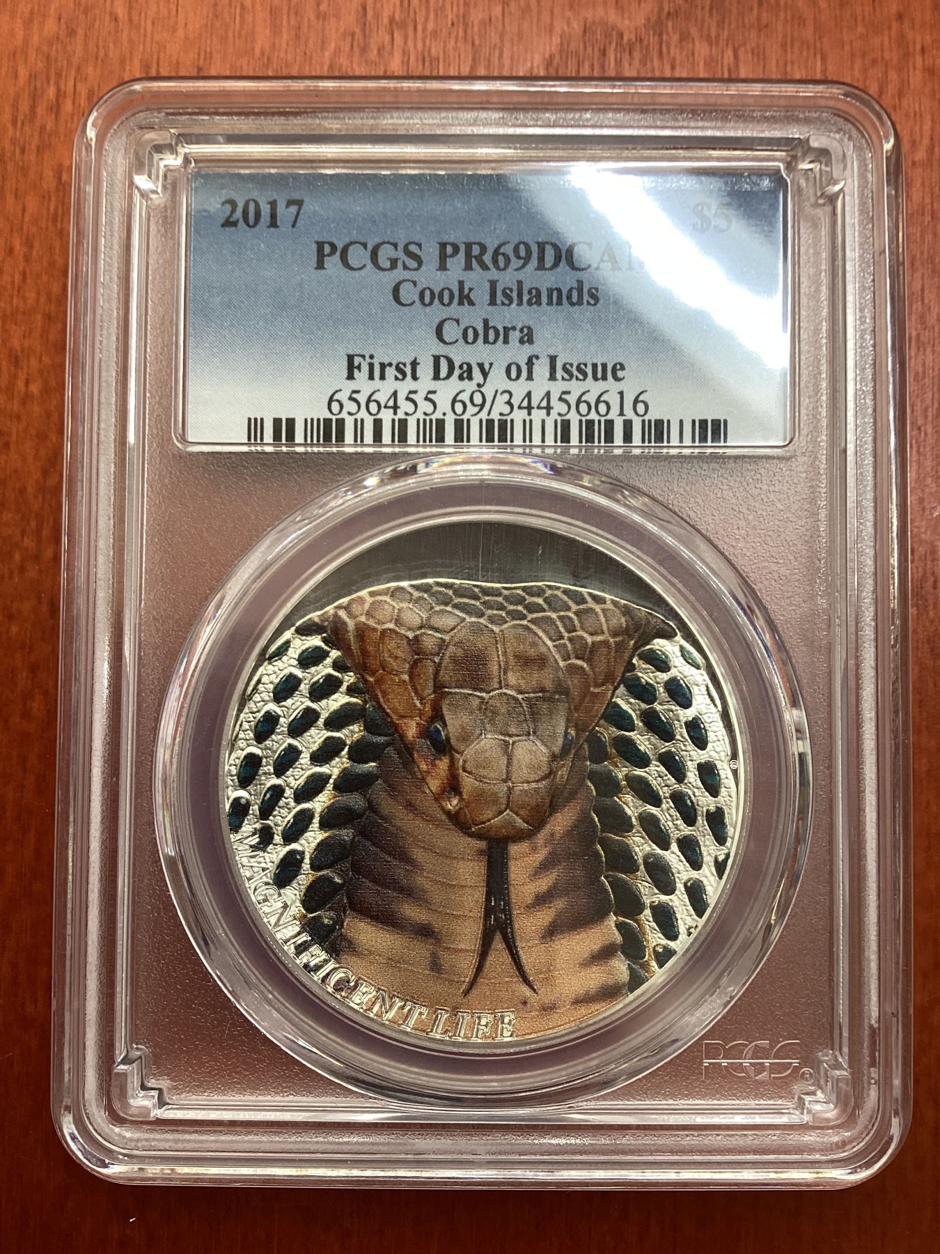 长老汇龙年精选第三场 2017 库克眼镜蛇5元彩色精制银币，PCGS PR69DCAM，首日标