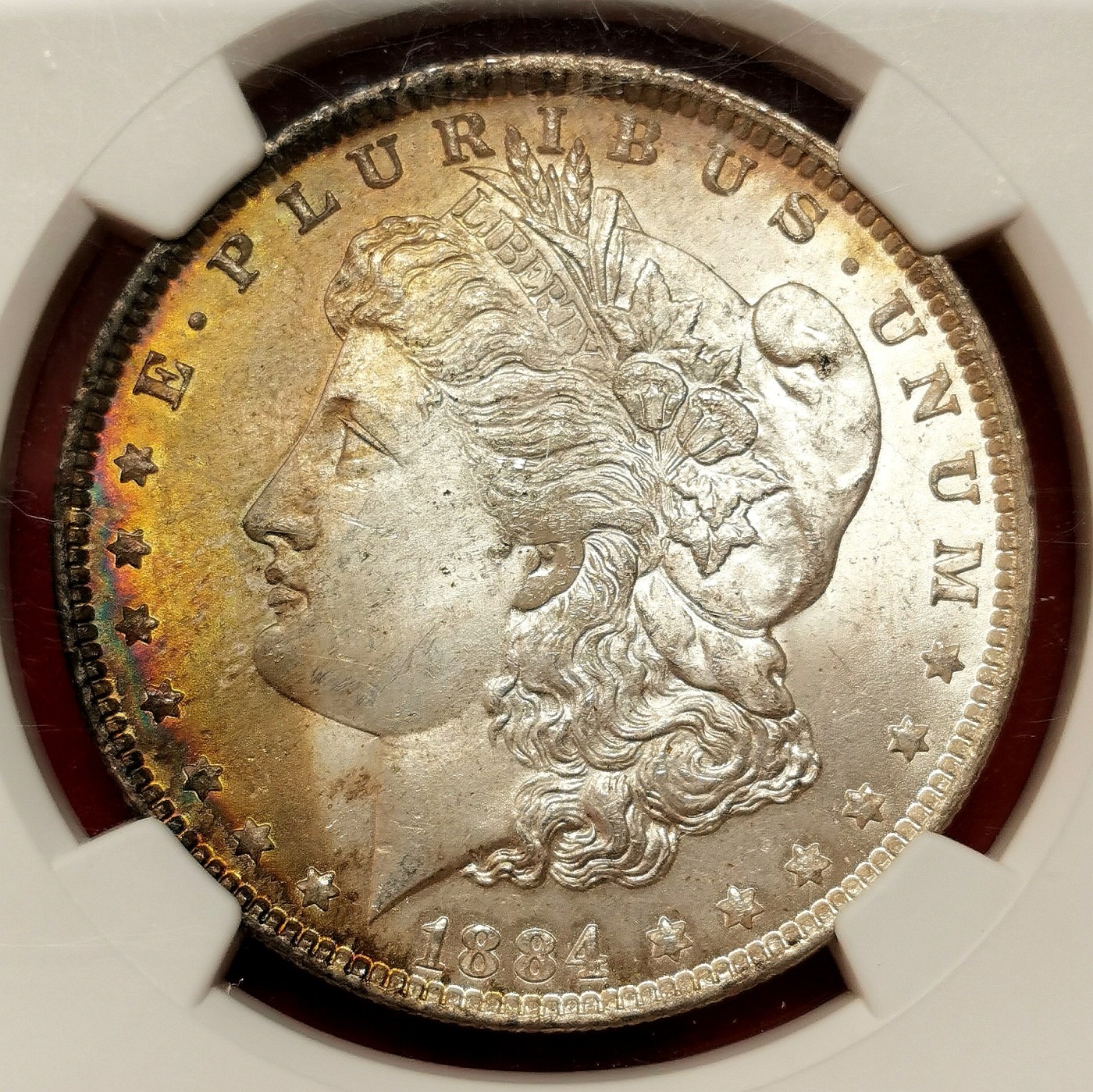 凡希社世界钱币微拍第二百六十四期 荐！1884O美国摩根壹元MGC-MS65 香槟金渐变五彩，美物！