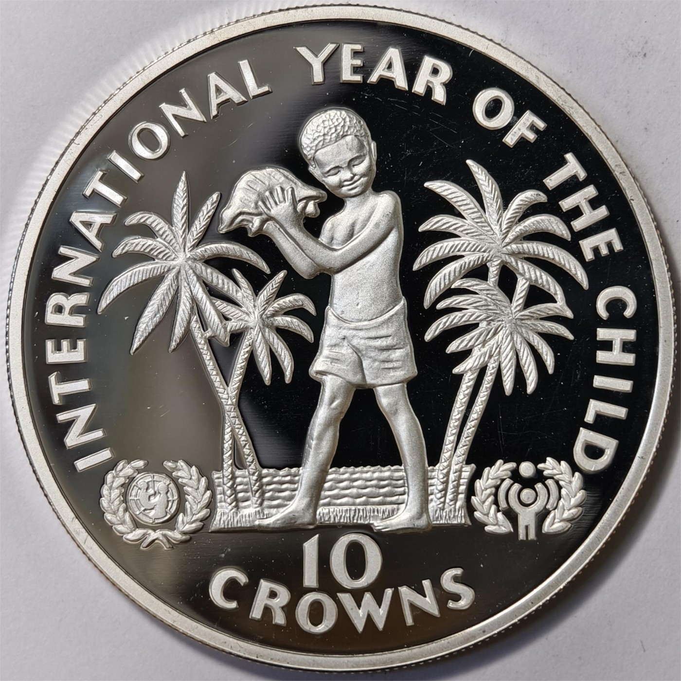 紫瑗钱币——第332期拍卖 特克斯与凯恩斯 1982年 国际儿童年 10克朗 23.32克 0.925银 精制