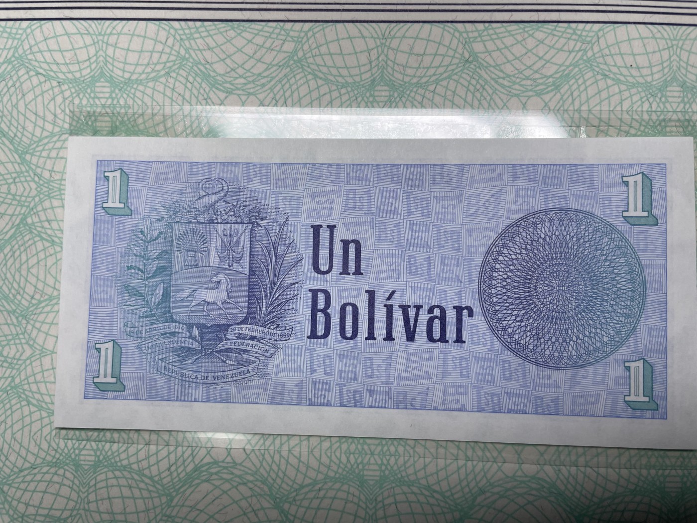 本期拍完结算-2024年集古藏今外币拍卖第二期-第10场-特殊纸币专场（总第20拍） 全新1989年委内瑞拉1玻利瓦尔纸币-因为印制硬币的成本超过硬币本身的价值而印制了同等面额的纸币