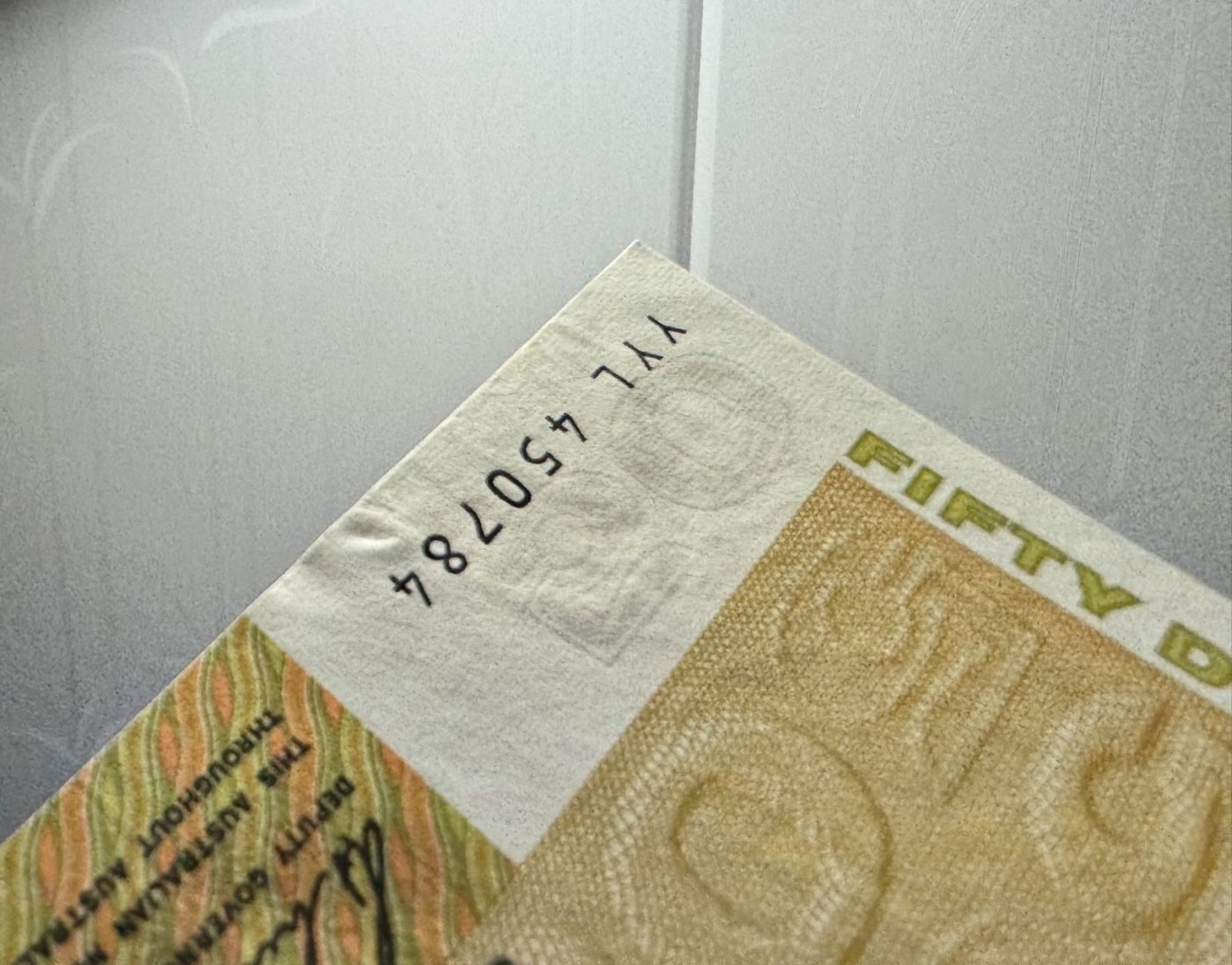收藏联盟Quantum Auction 第333期拍卖  澳大利亚1973-94年50元 品相UNC 边缘有瑕疵 细节如图