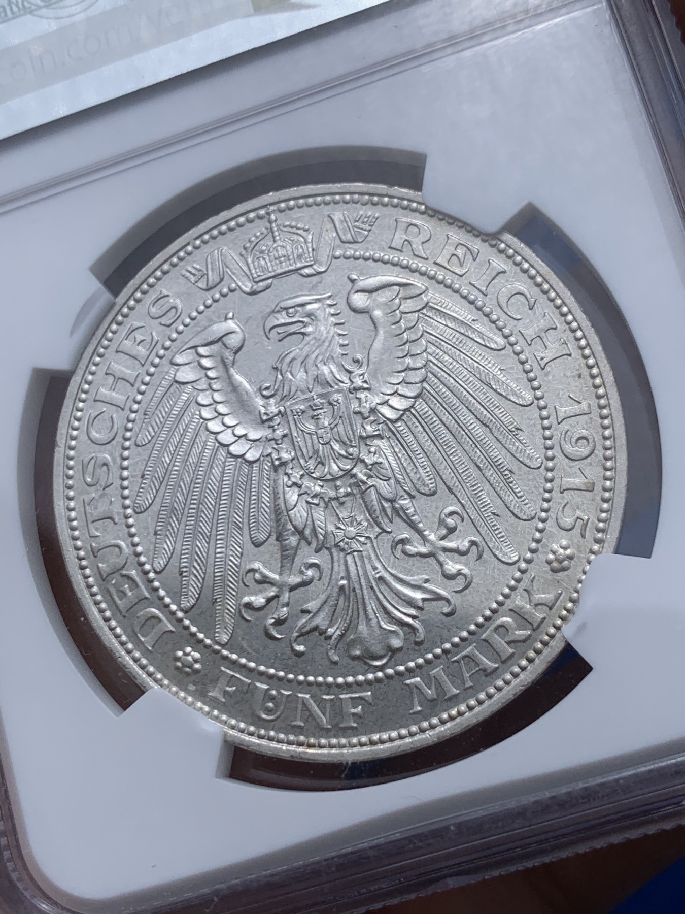 《竞宝斋》第251场-周日，周一2场连拍 (全场包邮) NGC PF65 德国梅克伦堡-什末林大公国 1915年精制币5马克 高端马克品种，铸造量1万枚（包含了普制和精制），底板完美，价值低估品种，收藏级