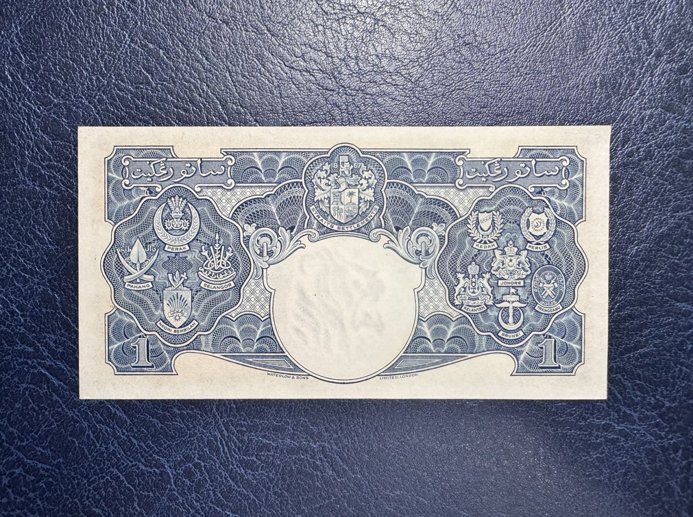 收藏联盟Quantum Auction 第333期拍卖  英属马来亚1941年1元 品相UNC 票面有点钞痕 细节如图 乔治六世国王