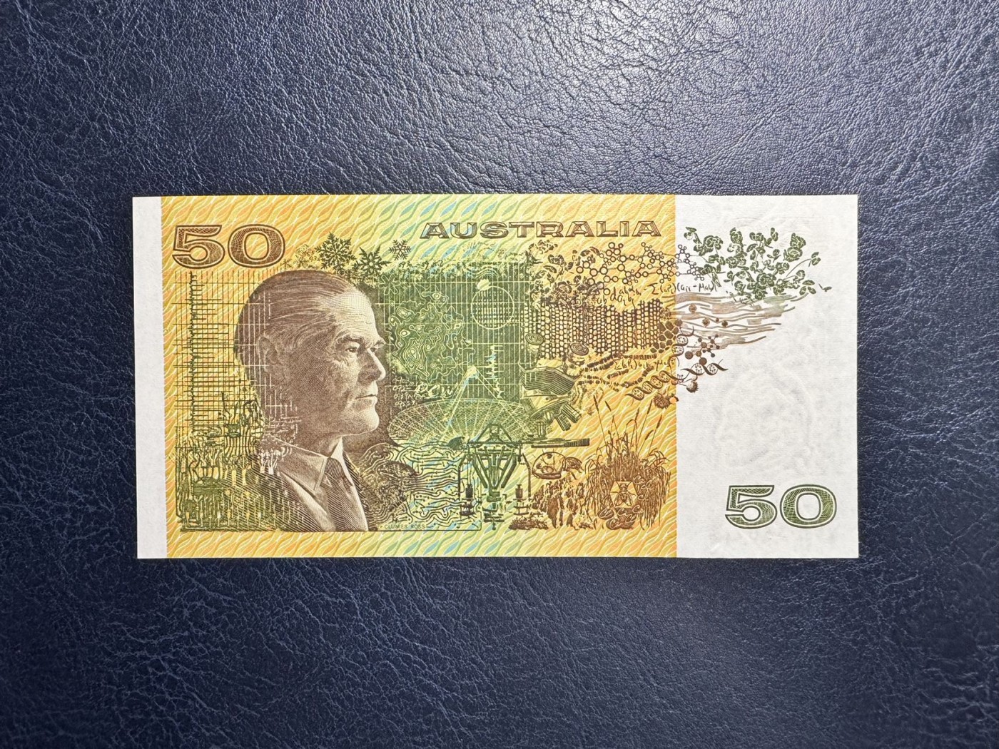 收藏联盟Quantum Auction 第333期拍卖  澳大利亚1973-94年50元 品相UNC 边缘有瑕疵 细节如图