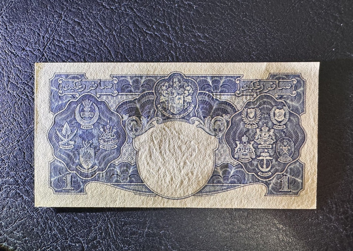 收藏联盟Quantum Auction 第333期拍卖  英属马来亚1941年1元 品相UNC 票面有点钞痕 细节如图 乔治六世国王