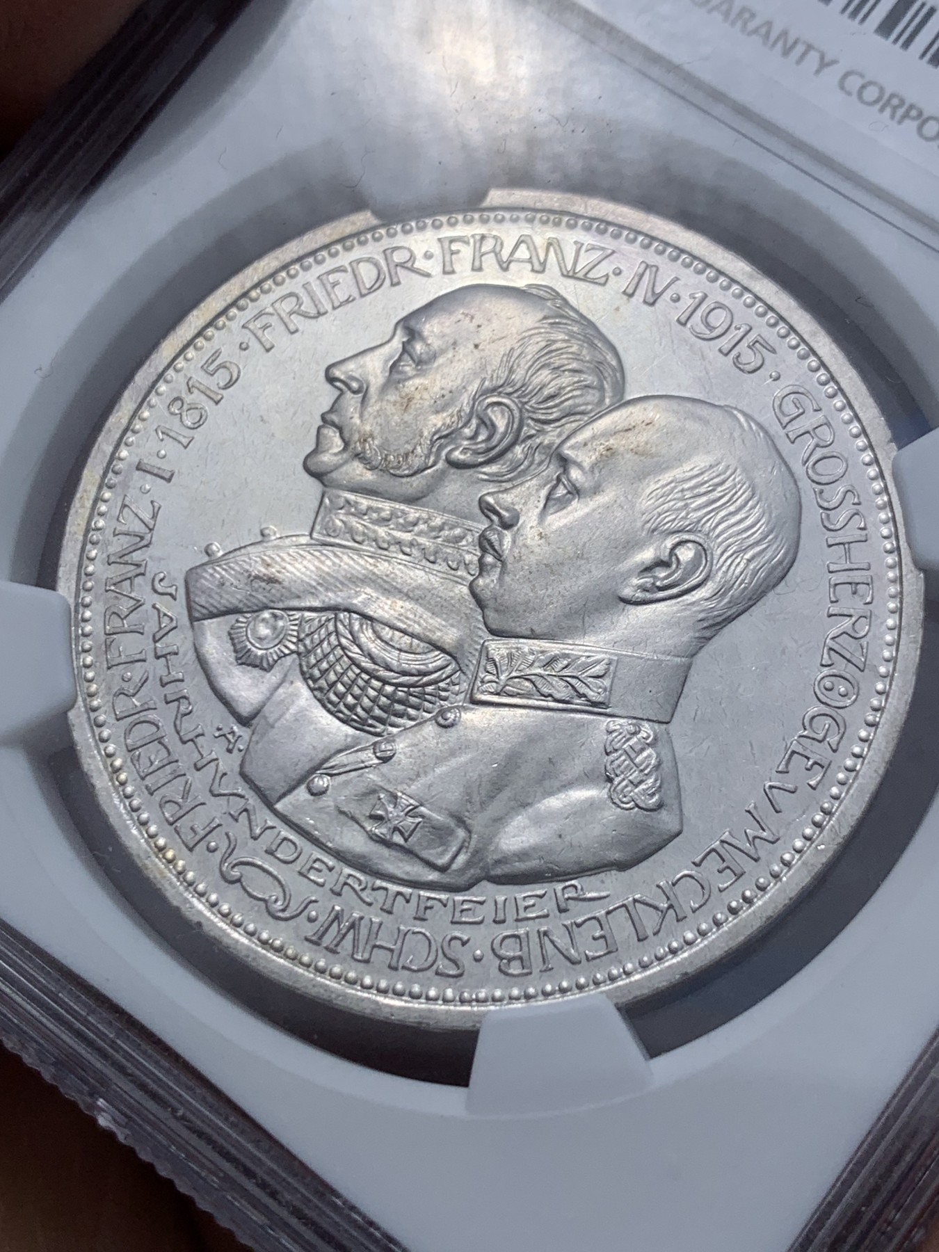 《竞宝斋》第251场-周日，周一2场连拍 (全场包邮) NGC PF65 德国梅克伦堡-什末林大公国 1915年精制币5马克 高端马克品种，铸造量1万枚（包含了普制和精制），底板完美，价值低估品种，收藏级