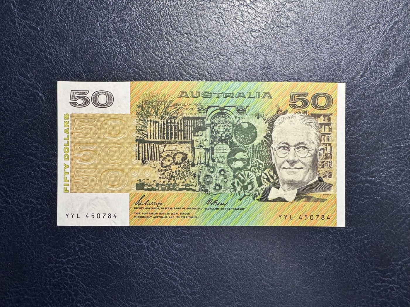收藏联盟Quantum Auction 第333期拍卖  澳大利亚1973-94年50元 品相UNC 边缘有瑕疵 细节如图
