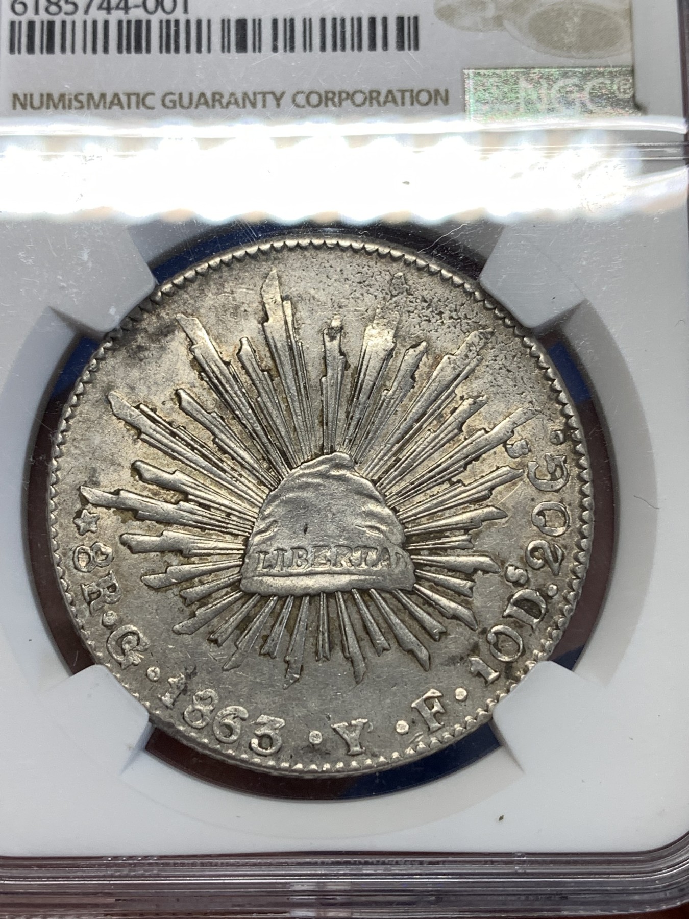 《竞宝斋》第251场-周日，周一2场连拍 (全场包邮) NGC AU58 墨西哥 1863年 8瑞尔 鹰洋 银币 GO厂 这年基本都是正常版 此枚看年份数字细节像是骑字版