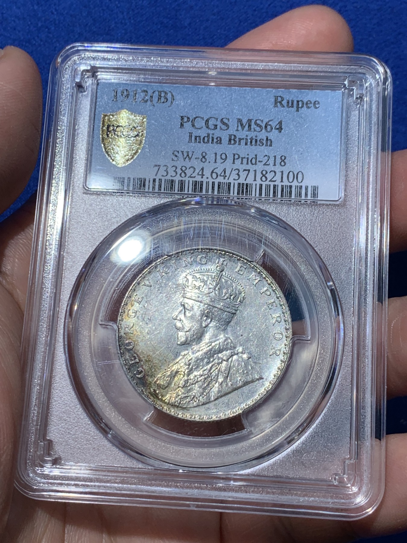 《竞宝斋》第251场-周日，周一2场连拍 (全场包邮) PCGS MS64 英属印度 1912年(B)1卢比银币 乔治五世 币面有少见氧化彩，非一般白币