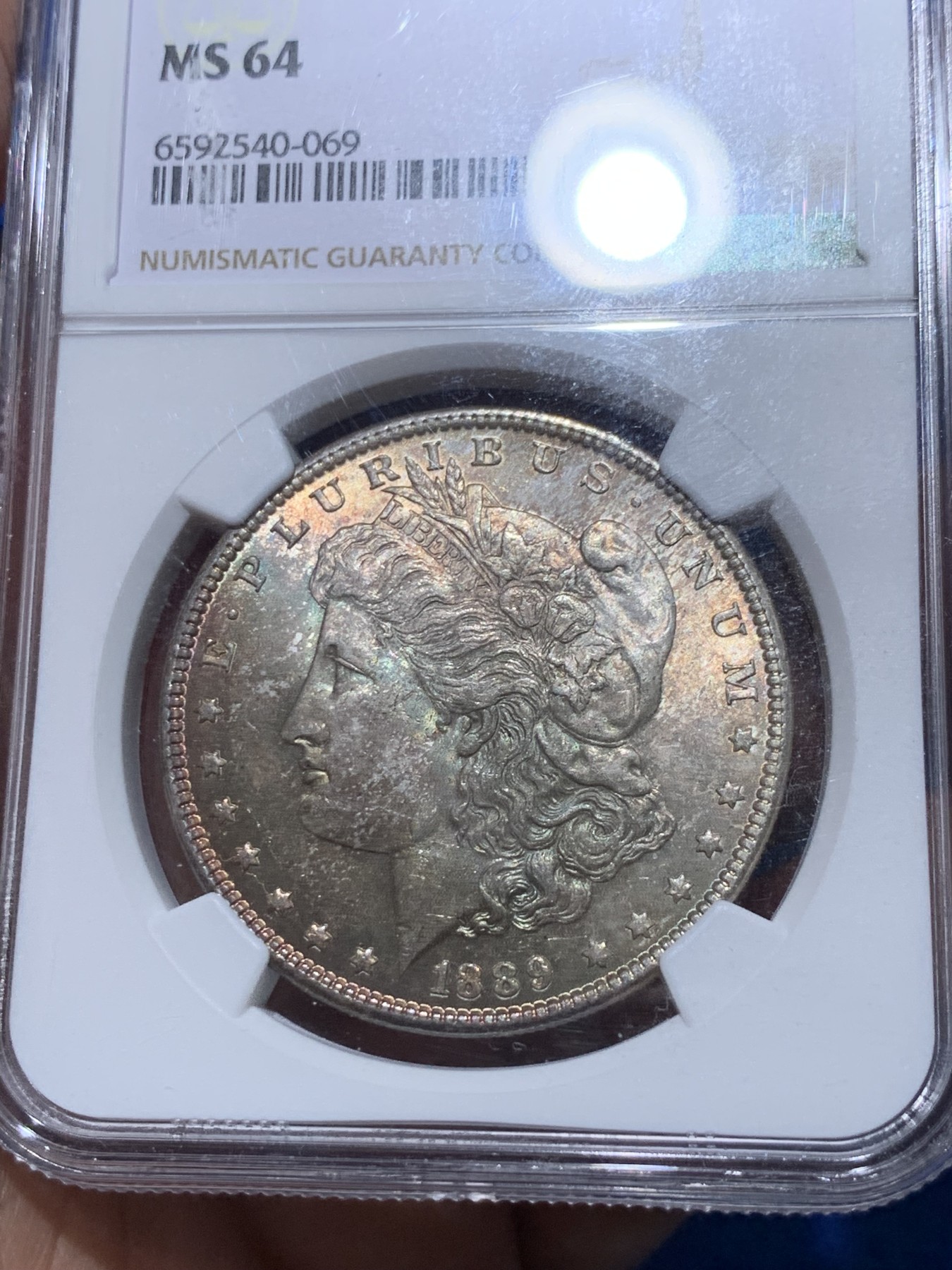 《竞宝斋》第251场-周日，周一2场连拍 (全场包邮) NGC MS64 美国1889年摩根银币P版，少见年份。