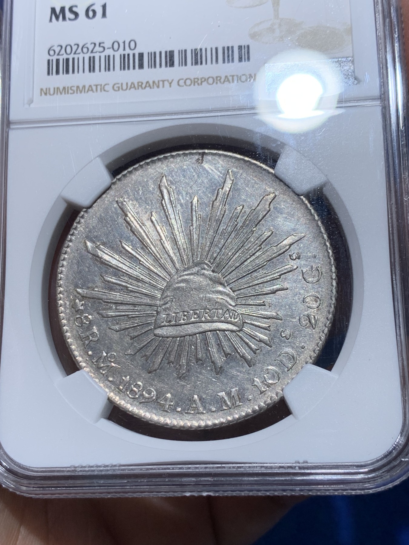 《竞宝斋》第251场-周日，周一2场连拍 (全场包邮) NGC MS61 墨西哥1894花边鹰洋 底板有PL质感 羽毛根根分明 低评 61分少见这样的