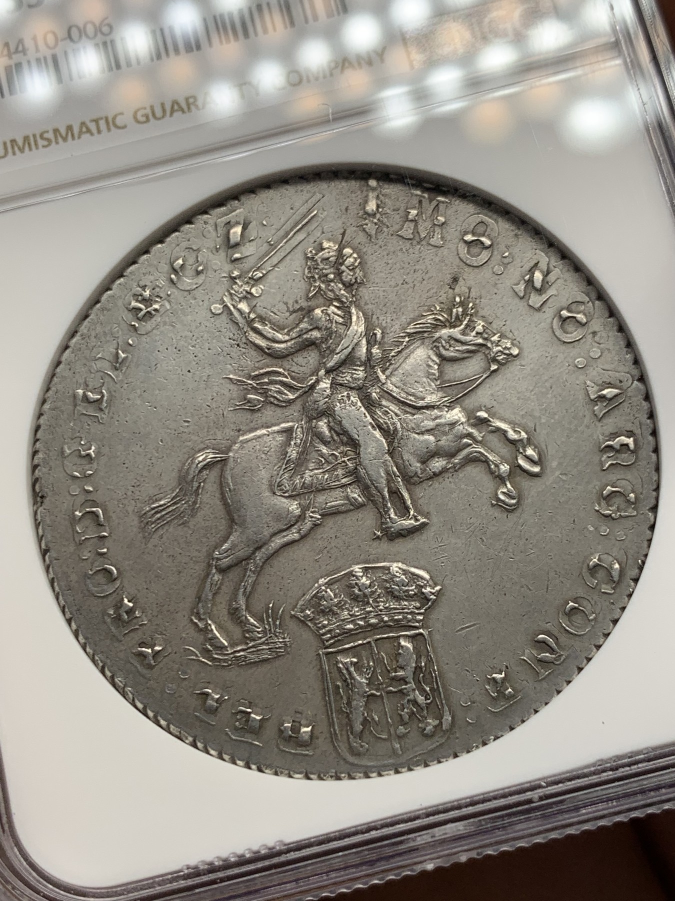 《竞宝斋》第252场-周日，周一2场连拍 (全场包邮) 唯一冠军分 NGC AU55 荷兰 海尔德兰省 1杜卡特 大马剑银币 稀见厂别  正面复打奔马更显灵动 背面打制近乎完美 毕业品种不可错过