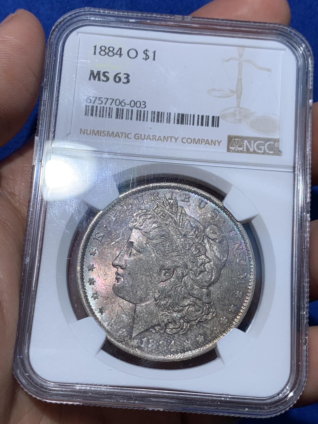 《竞宝斋》第252场-周日，周一2场连拍 (全场包邮) NGC MS63 美国1884年摩根银币O版，双面五彩。
