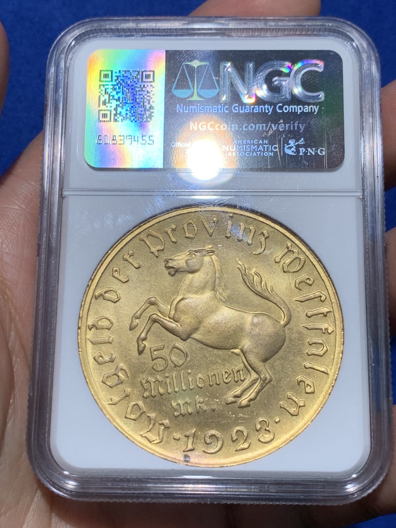 《竞宝斋》第252场-周日，周一2场连拍 (全场包邮) NGC MS64 1923年德国德紧威斯特伐利亚5千万马克镀金铜币 马币全套中的第二大面额，镀金层完好，金光闪闪。