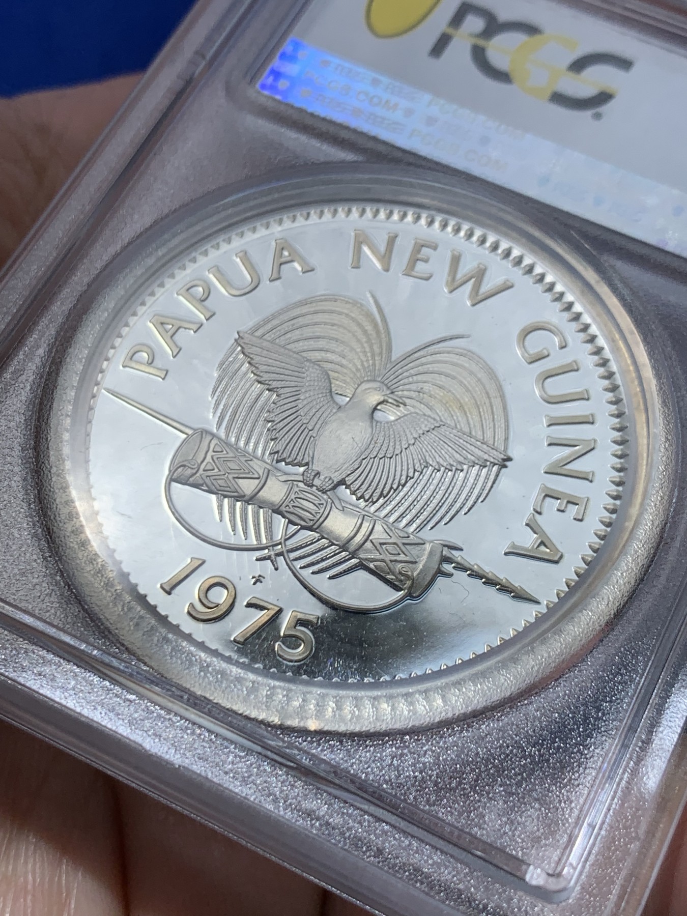 《竞宝斋》第252场-周日，周一2场连拍 (全场包邮) PCGS PR68 巴布新几内亚1975年天堂鸟10基纳精制银币