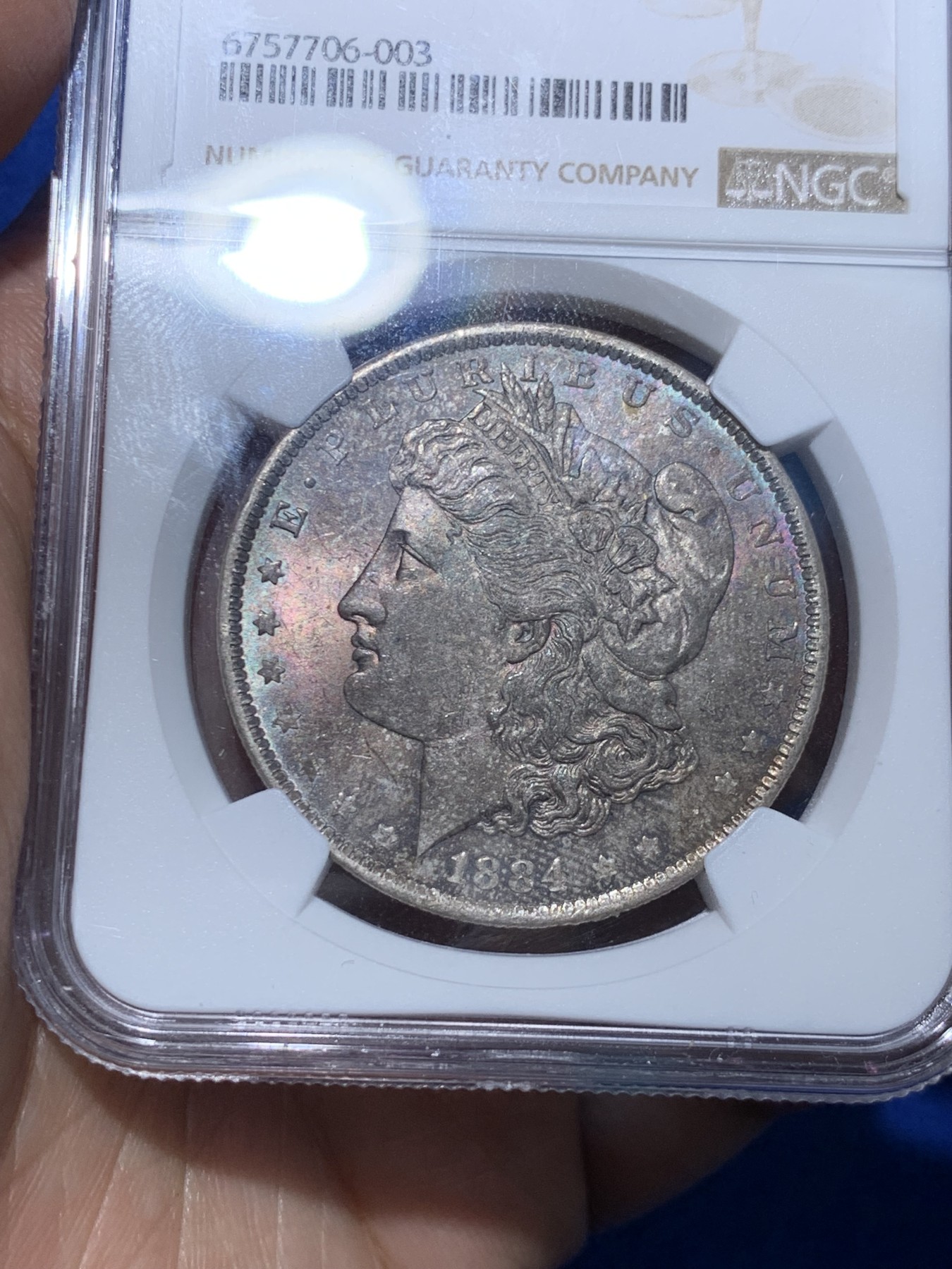 《竞宝斋》第252场-周日，周一2场连拍 (全场包邮) NGC MS63 美国1884年摩根银币O版，双面五彩。