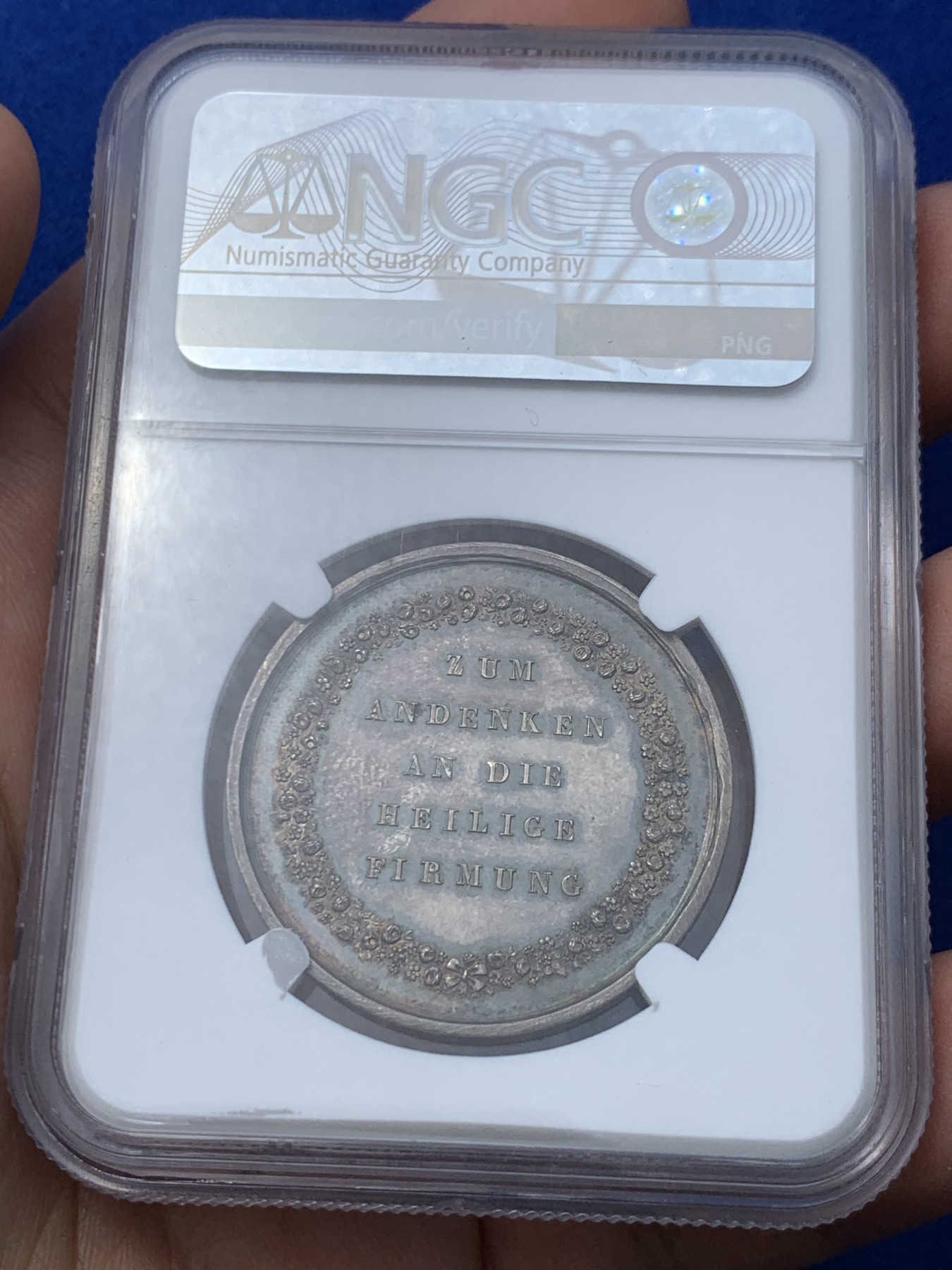 《竞宝斋》第252场-周日，周一2场连拍 (全场包邮) NGC MS61 19世纪德国宗教洗礼银章 镜面底板 五彩包浆 低评好品好状态