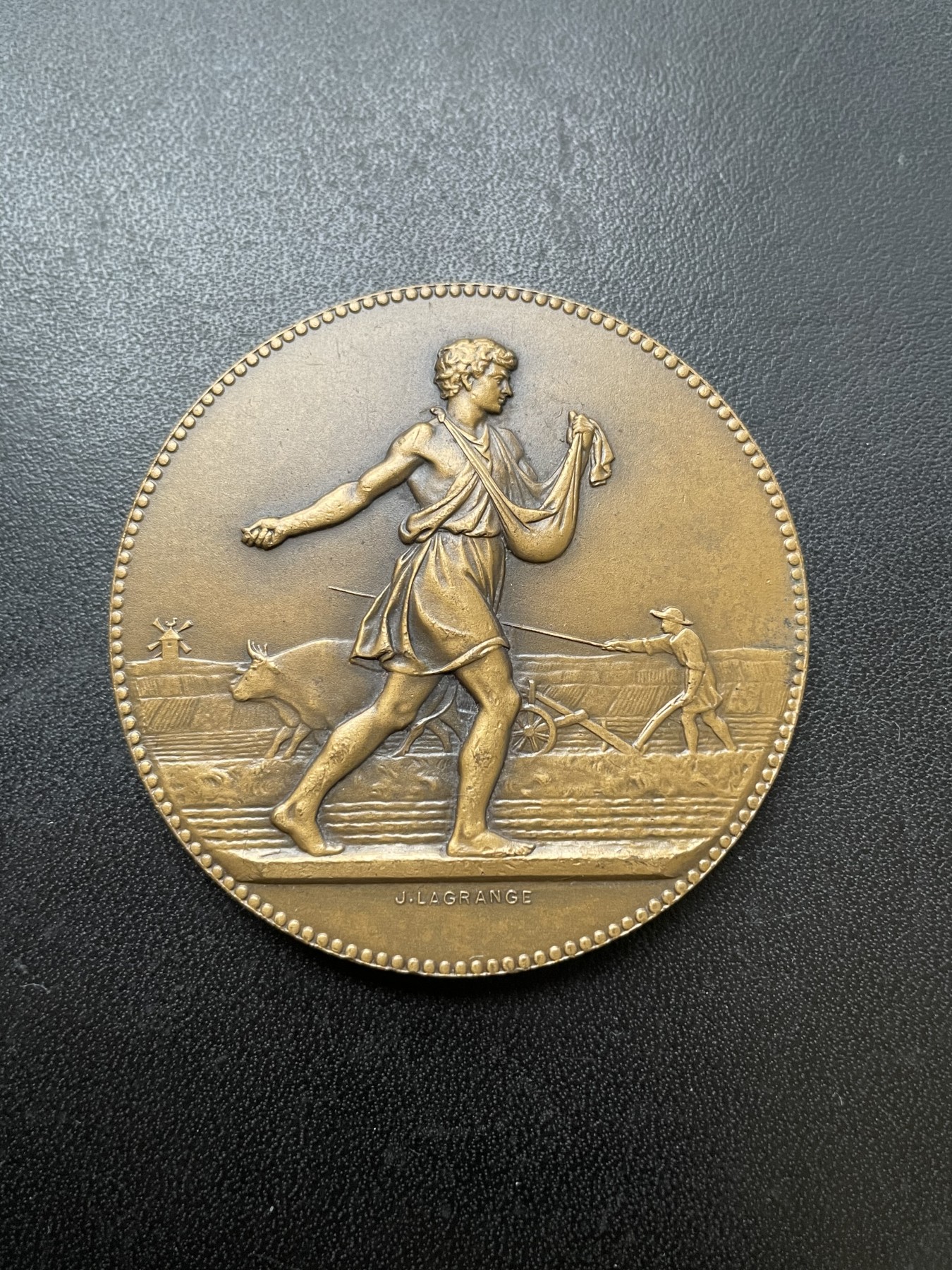 「木头集藏」章牌专场-第39期 Lagrange～法国“播种者”农业竞赛评委铜奖章  直径：50 mm，56 g，边铭：丰饶角 BRONZE 
