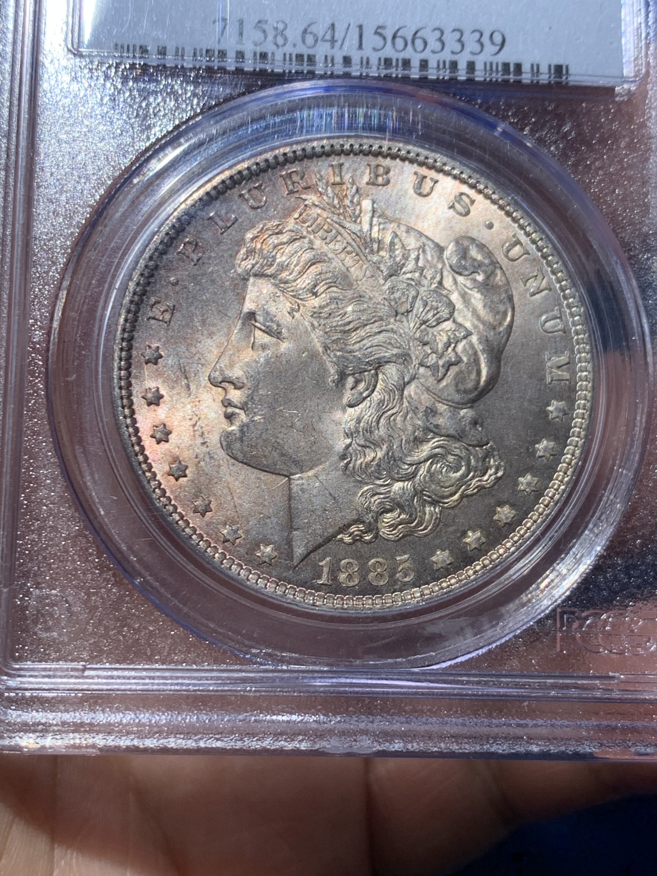 《竞宝斋》第253场-周日，周一，周二 3场连拍 (全场包邮) PCGS MS64 美国1885年摩根银币O版，币面清爽干净又漂亮，打制精美，状态一流，PC经典小白盒严评无官网图。