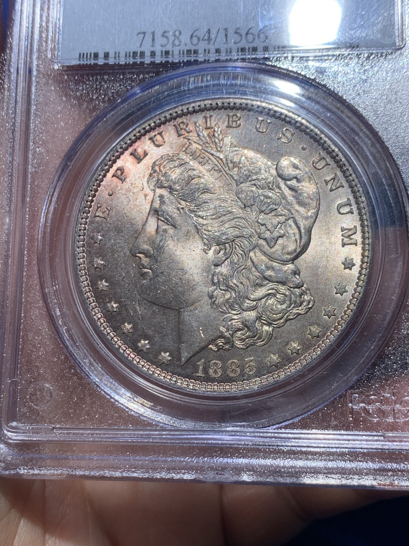 《竞宝斋》第253场-周日，周一，周二 3场连拍 (全场包邮) PCGS MS64 美国1885年摩根银币O版，币面清爽干净又漂亮，打制精美，状态一流，PC经典小白盒严评无官网图。