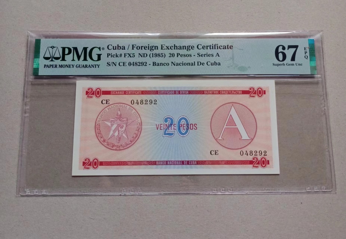 收藏联盟Quantum Auction 第335期拍卖  古巴1985年外汇券20比索冠军分和奥地利1922年1克朗  PMG67&66