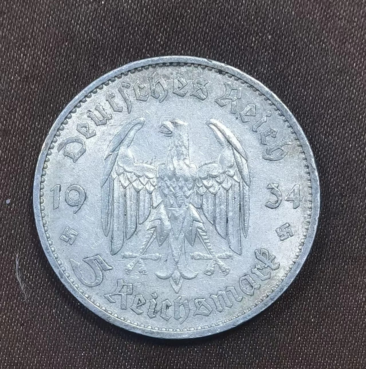北京马甸外国币专卖微拍第118期，外国金银专场，陆续上新，欢迎关注  1934年德国加字教堂5马克银币，重量：13.88克，成色：900 详