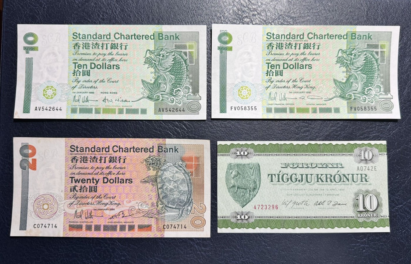 收藏联盟Quantum Auction 第336期拍卖  香港渣打银行1985-93年10和20元和法罗群岛1974年10克朗 品相分别为UNC和UNC-及XF