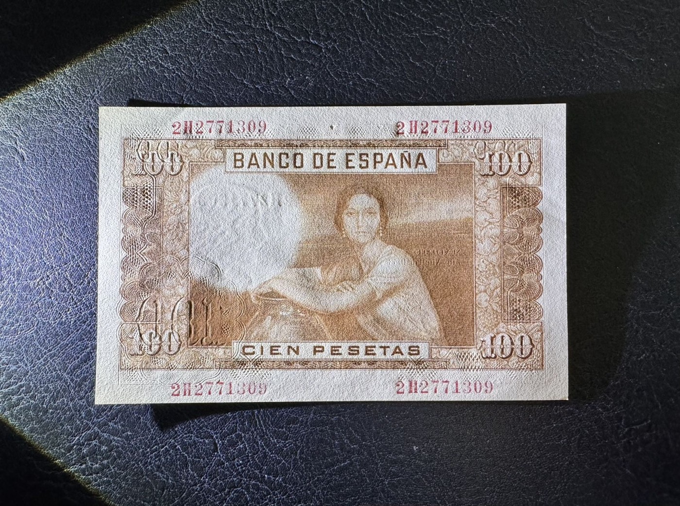 收藏联盟Quantum Auction 第336期拍卖  西班牙1955年100比塞塔 品相UNC 一角轻微点钞痕 号码无4  名模冈萨雷斯画像