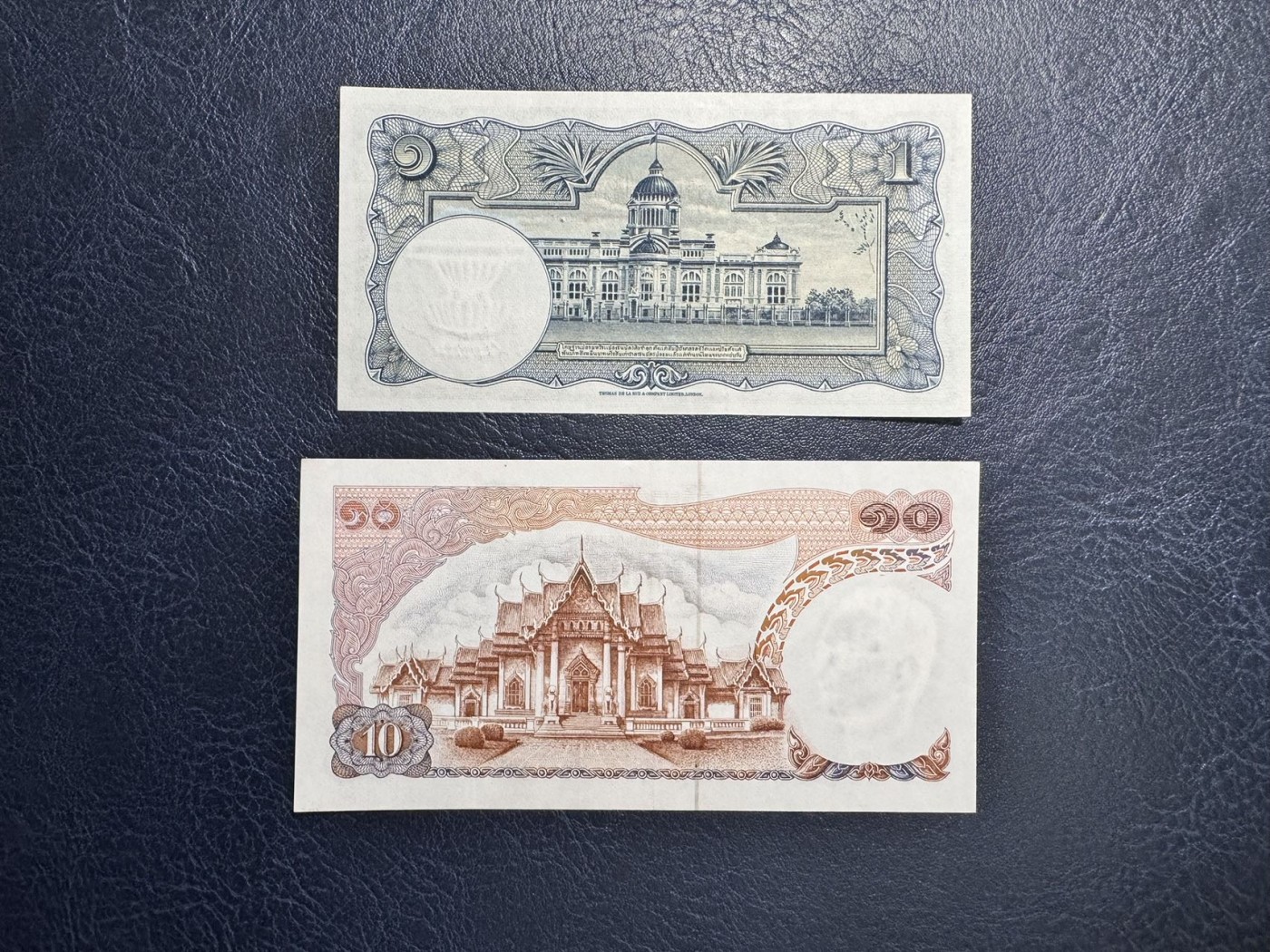 收藏联盟Quantum Auction 第336期拍卖  泰国1955年1泰铢和1969版10泰铢 非全新 品相如图 1铢有针孔