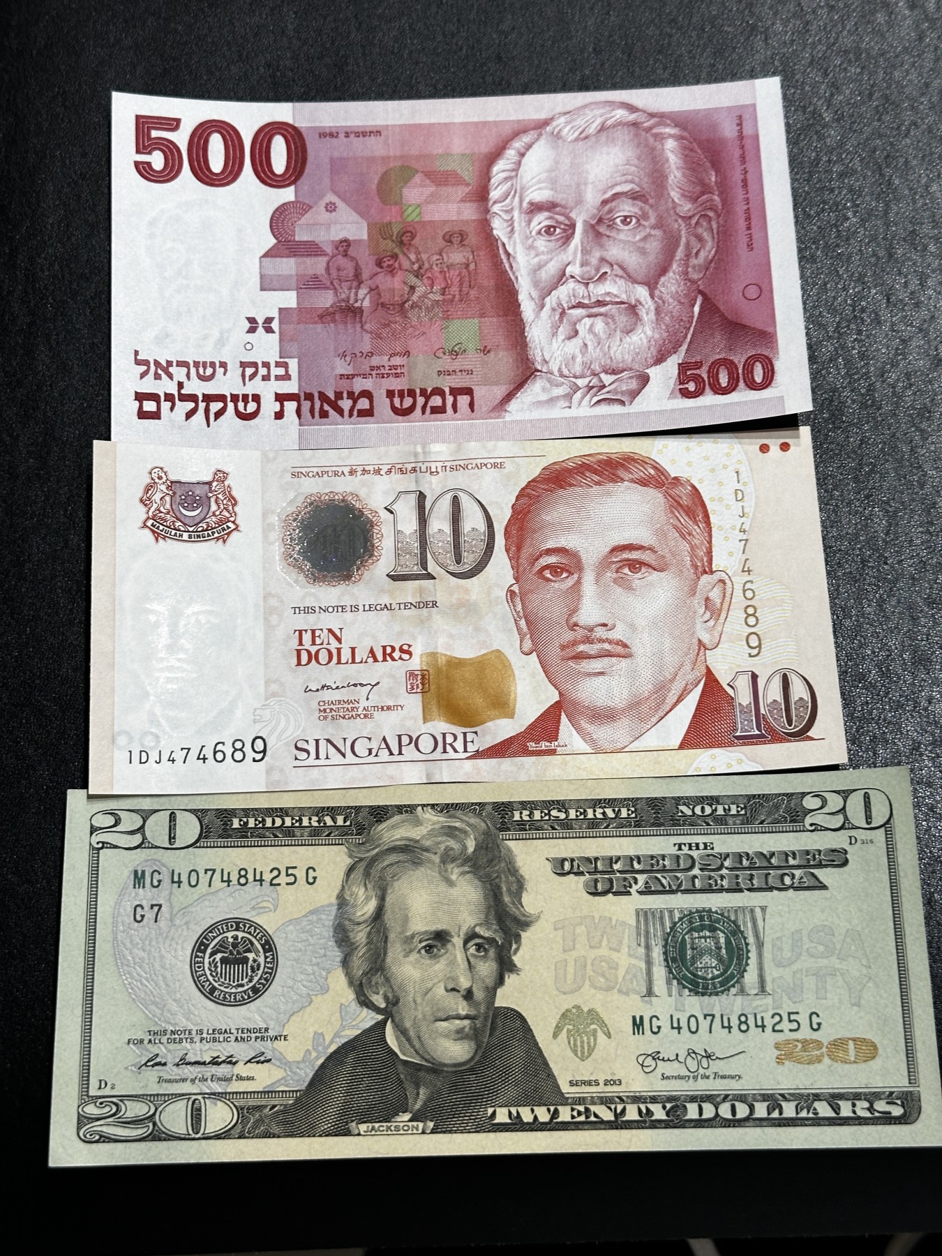 《外钞收藏家》第三百五十五期（连拍第二场） 以色列、新加坡、美元 三张一起 全新 美元轻微荧光反应