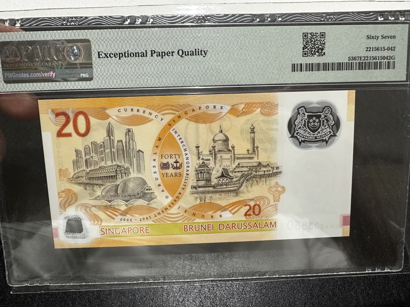 《外钞收藏家》第三百五十五期（连拍第二场） 2007年新加坡20元 无47 PMG67 纪念钞