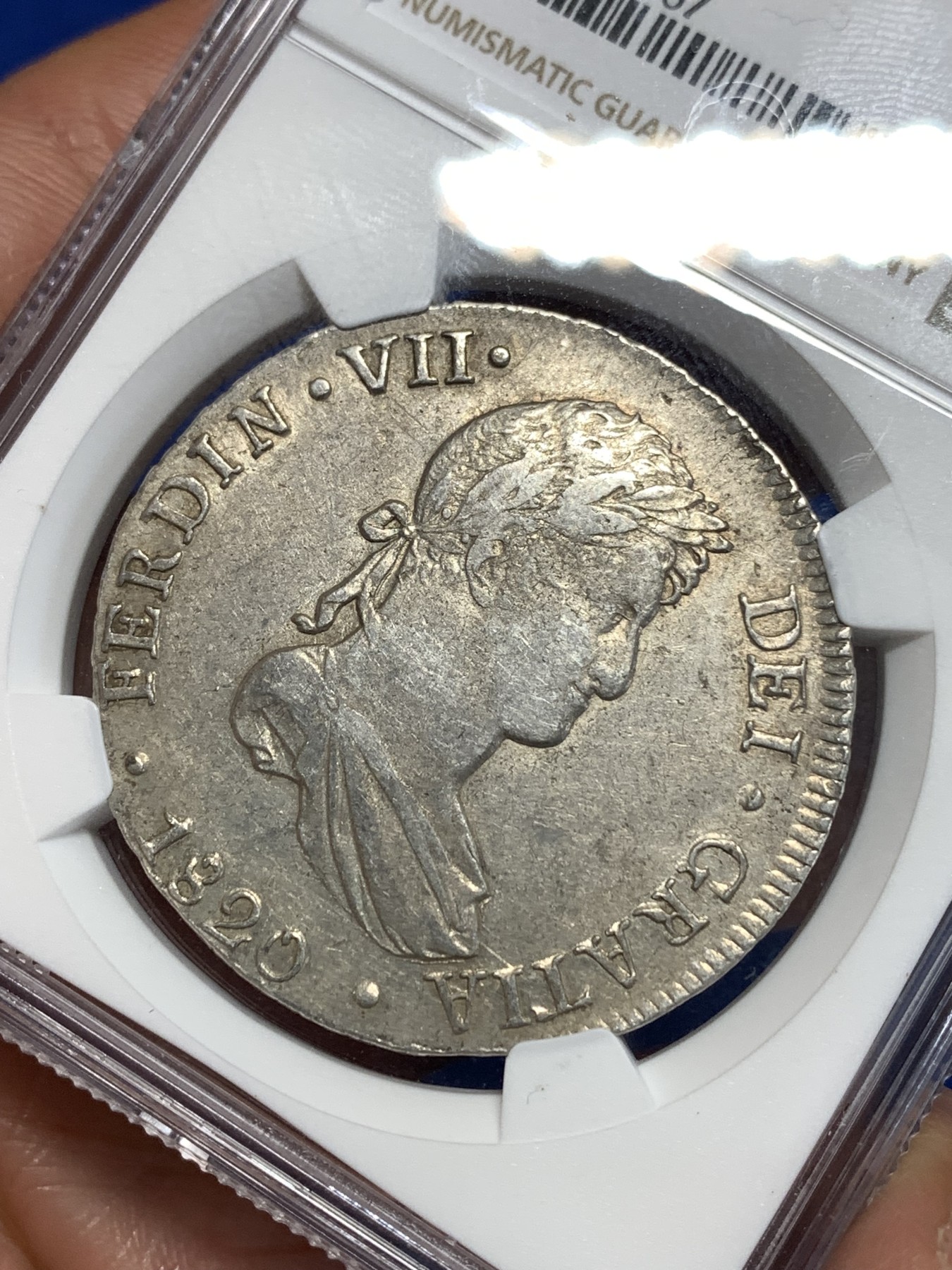 《竞宝斋》第257场-周日，周一 2场连拍 (全场包邮) NGC XF45 西属秘鲁1820年斐迪南七世8R银币 打制的还不错  有分难得