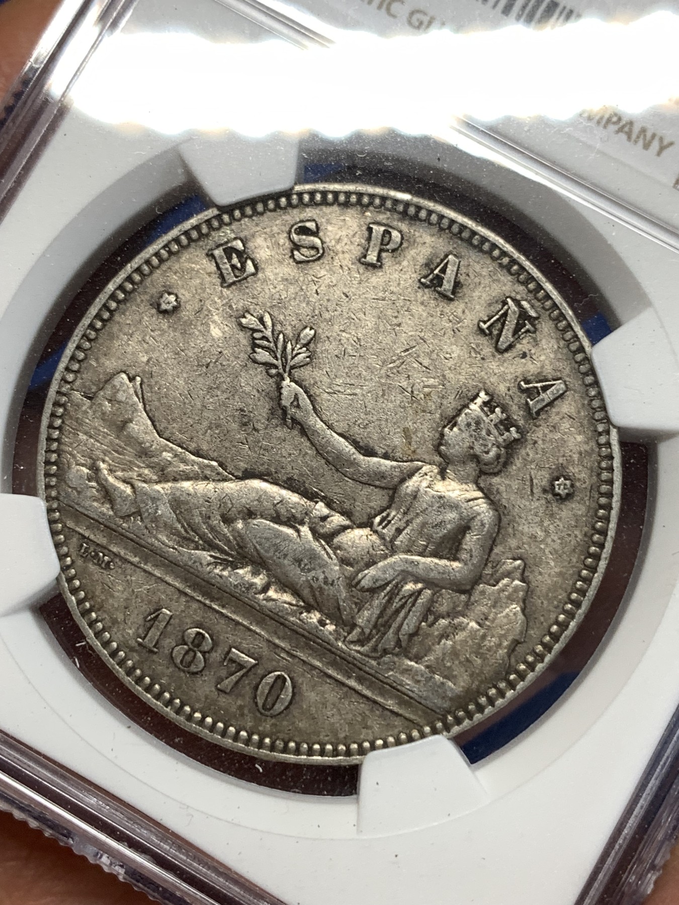 《竞宝斋》第257场-周日，周一 2场连拍 (全场包邮) NGC XF40 西班牙1870年坐人拿花5比塞塔双柱银币