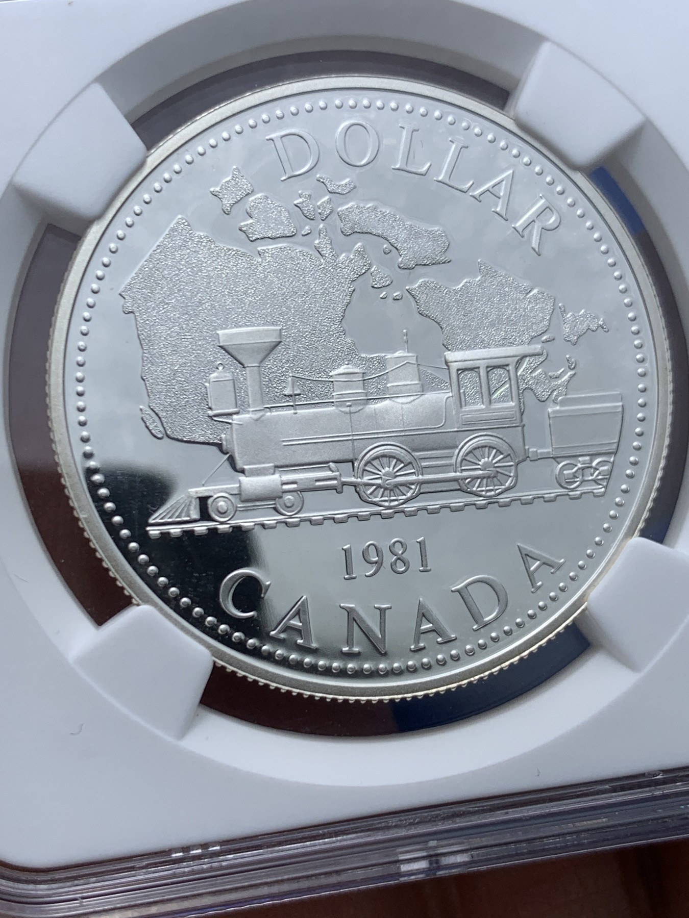 《竞宝斋》第257场-周日，周一 2场连拍 (全场包邮) NGC PF69UC 加拿大1981年大陆铁路精制纪念银币，币面清爽干净又漂亮，PROOF精制币，状态极佳。