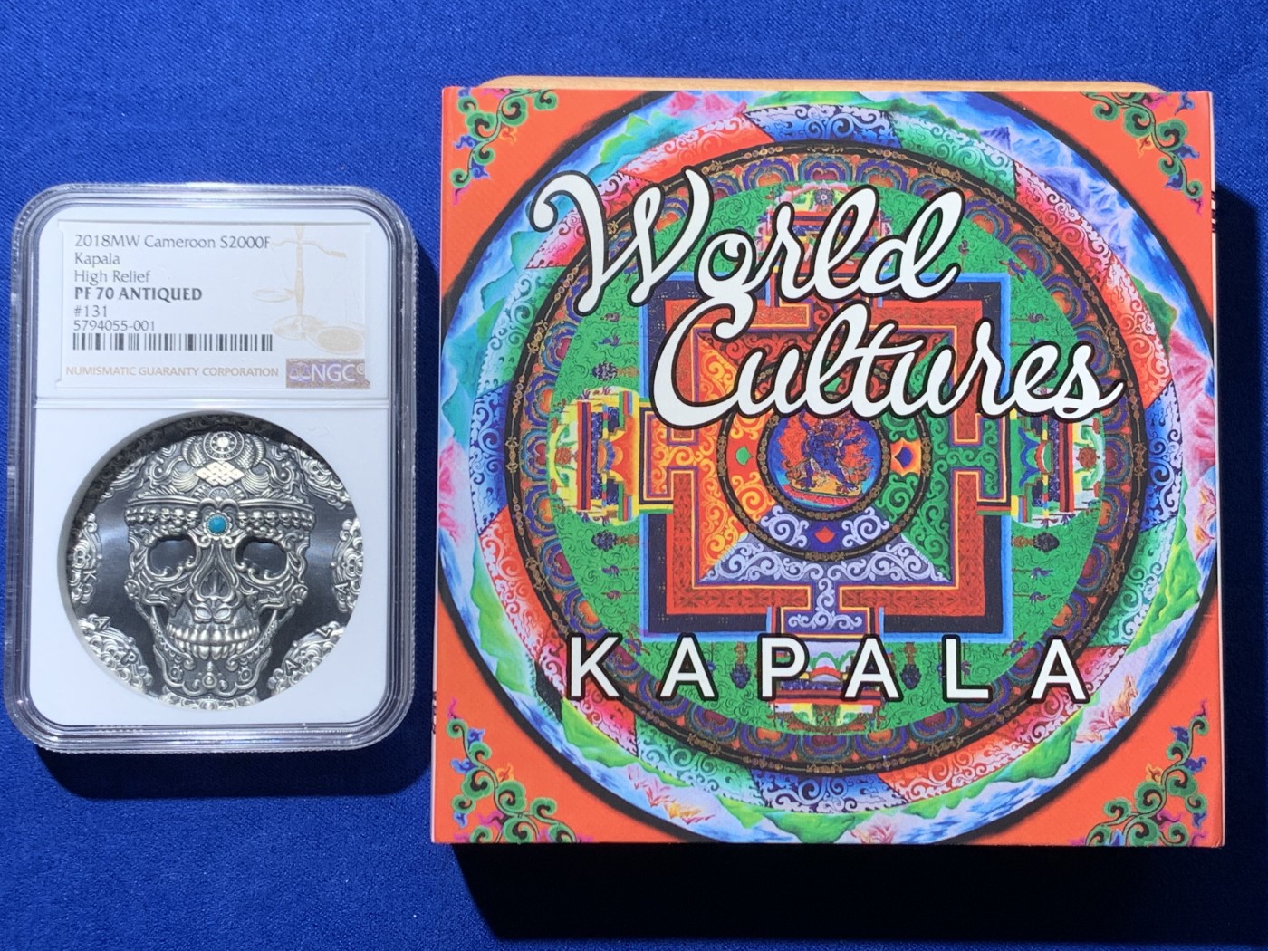 《竞宝斋》第257场-周日，周一 2场连拍 (全场包邮) NGC PF70 喀麦隆2018卡帕拉头盖镶嵌绿松石 2盎司 银币 131 盒证齐全 镶嵌工艺 世界文化系列首枚