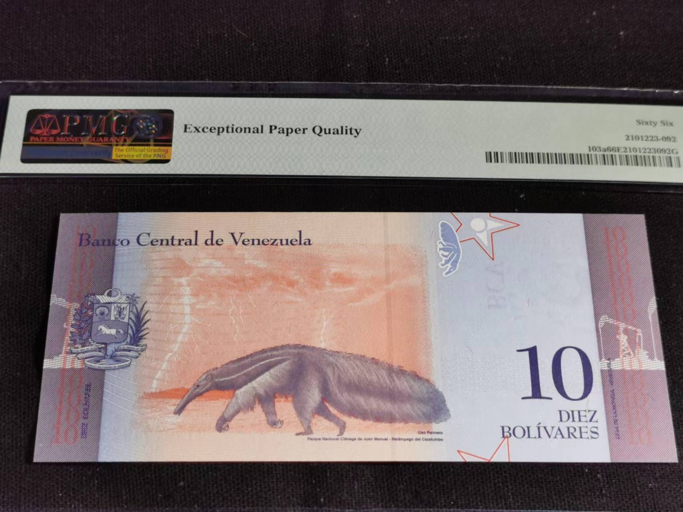 刘世昌艺术品销售中心～虎踞龙蟠*金杨在线联拍群第514期 委内瑞拉2018年10玻利瓦尔（PMG  66E  号码：C12616651）1枚。