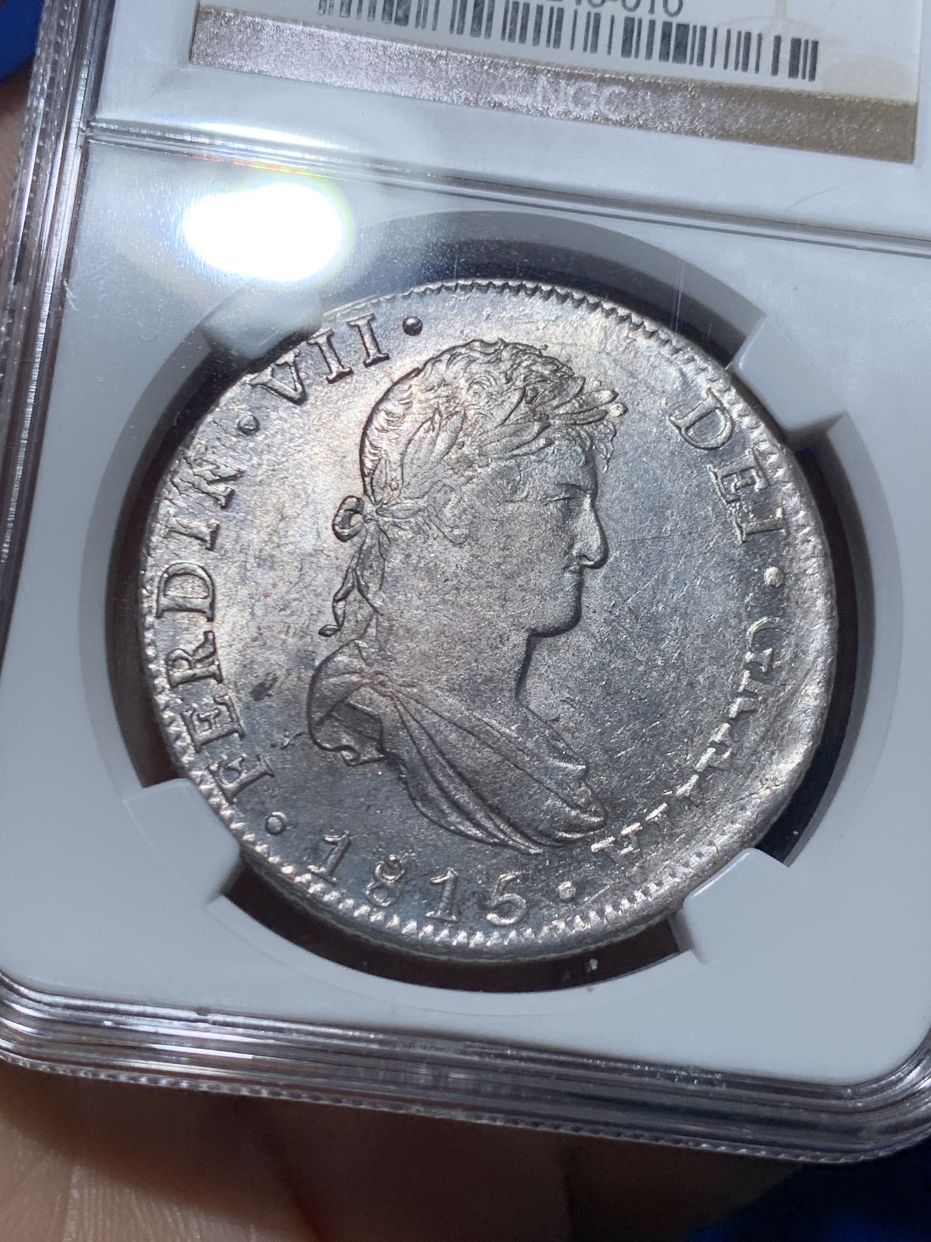 《竞宝斋》第257场-周日，周一 2场连拍 (全场包邮) NGC AU58 墨西哥1815年费迪南七世双柱银币