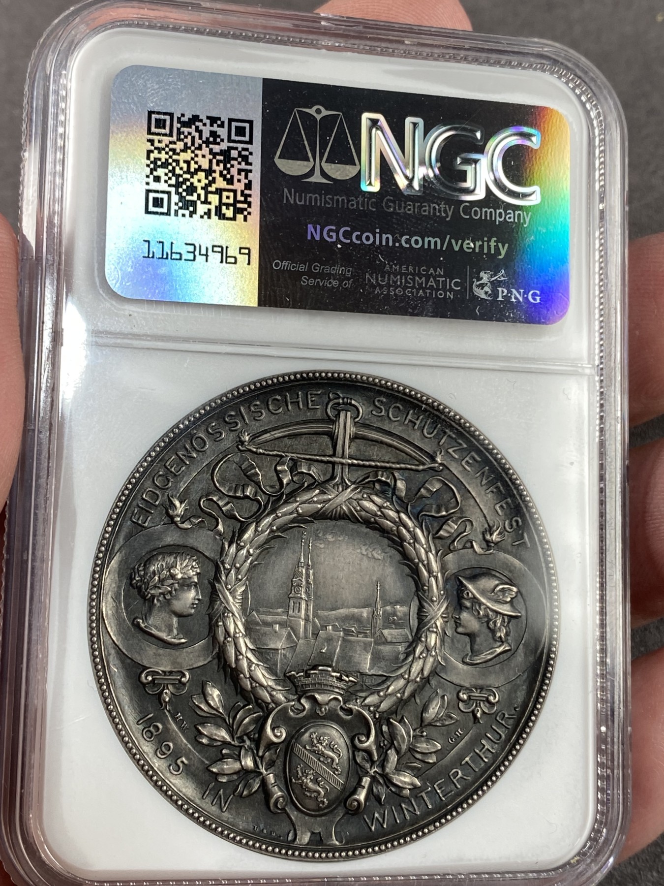 万国钱币拍卖第023期（金辉银韵之夜） NGC MS62 1895瑞士苏黎世温图瑟尔射击节大银章 非常漂亮的女神与景观的设计，原味黑包浆。