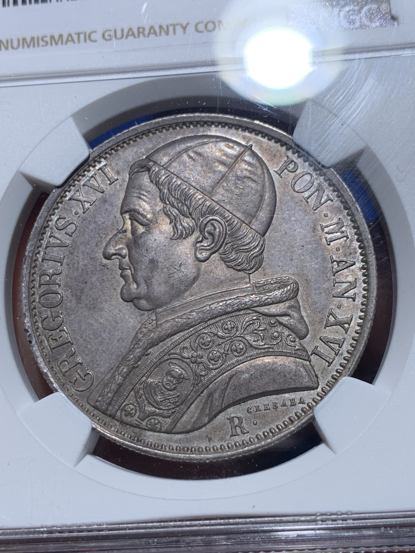 《竞宝斋》第257场-周日，周一 2场连拍 (全场包邮) NGC MS62 意大利 教皇国1846年格力高利十六世 1埃斯库多 少见的格力高利十六世，常见的都是庇护九世 PL镜面底板 ，银灰色包浆，非常漂亮