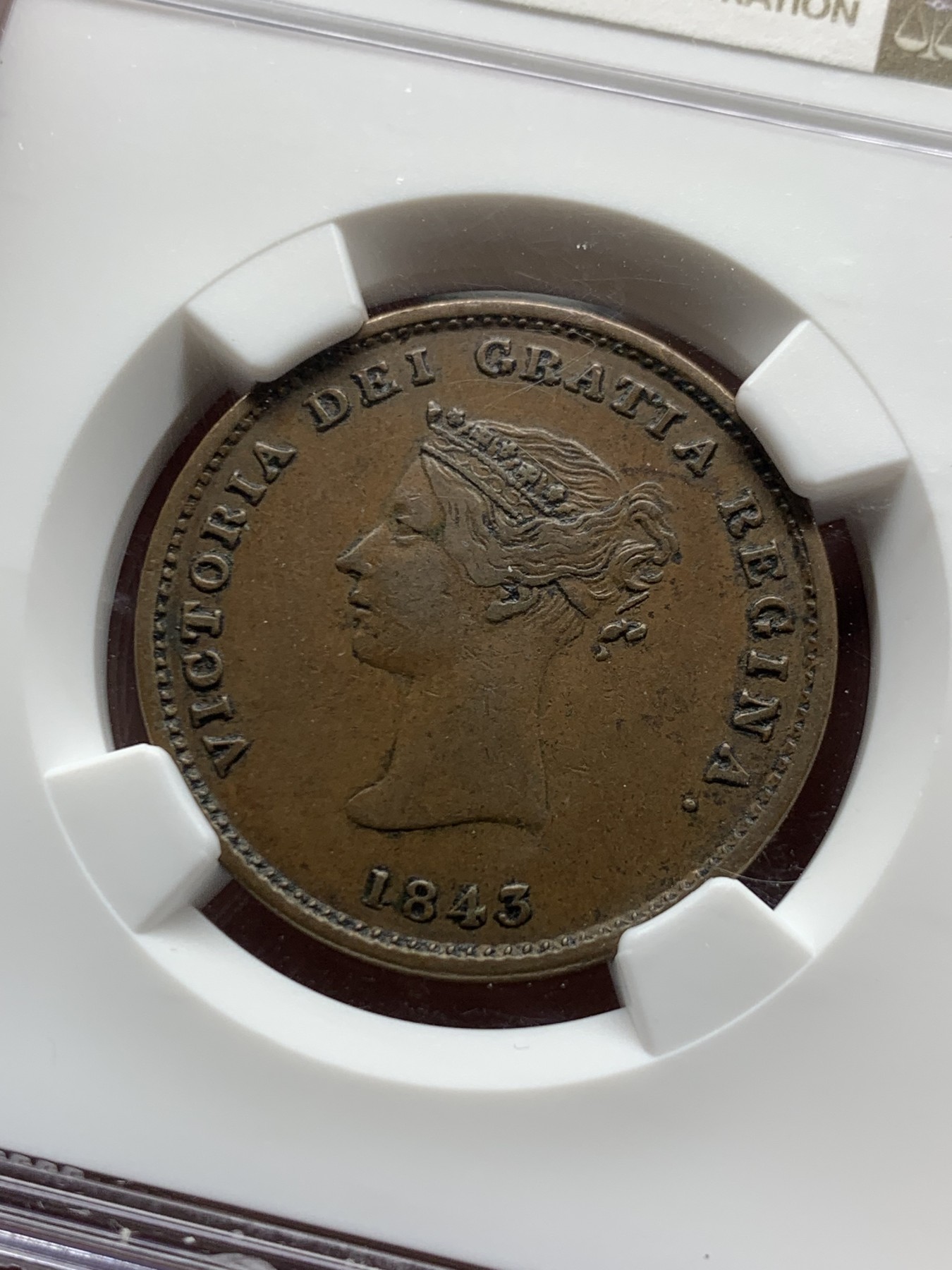 《竞宝斋》第257场-周日，周一 2场连拍 (全场包邮) NGC AU53BN 加拿大1843新布伦瑞克半便士铜币，早期加拿大难得一见，小维青年像+大帆船，比较讨喜的一版小维年轻头像。高分仅个位数，稀见品种