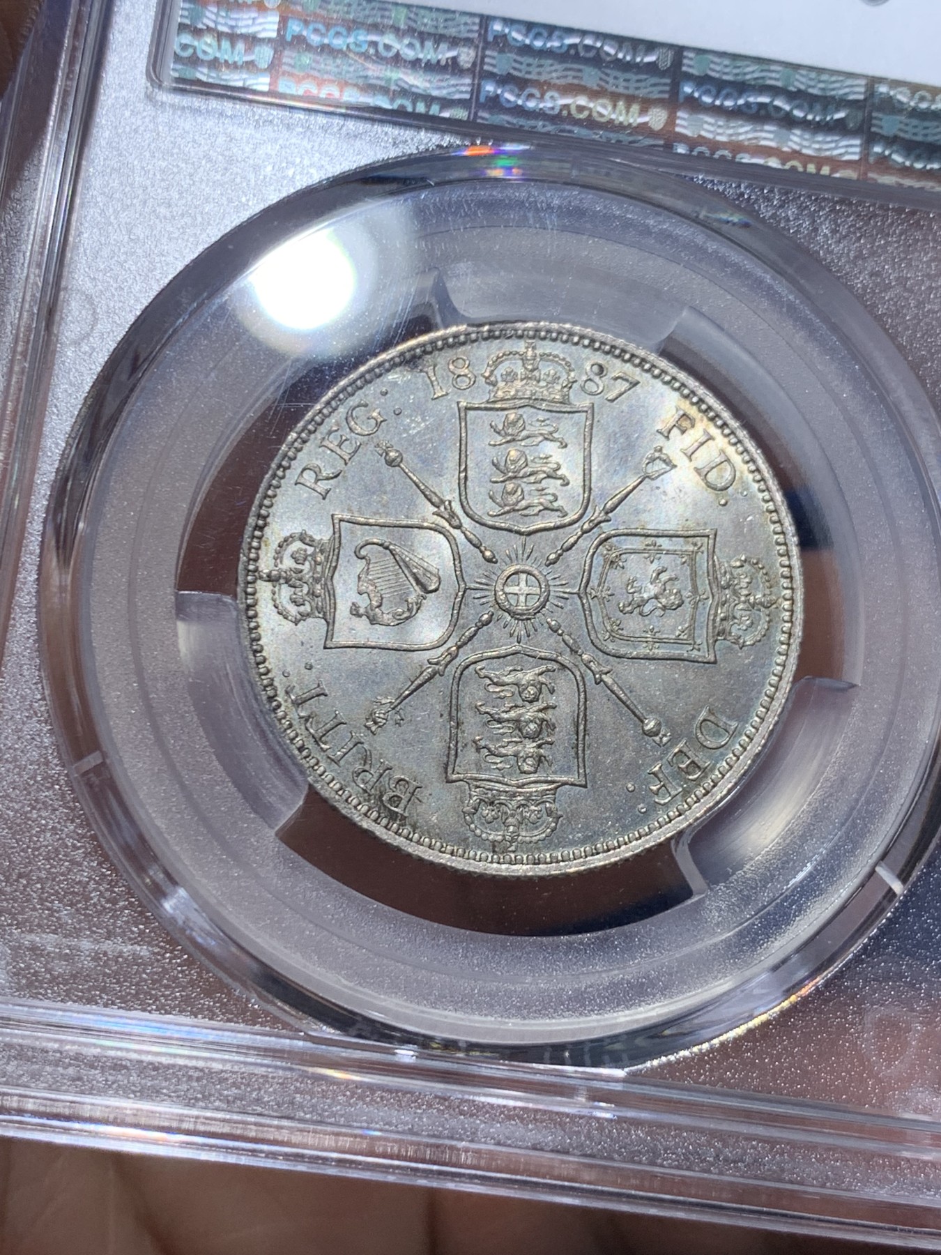 《竞宝斋》第257场-周日，周一 2场连拍 (全场包邮) PCGS MS64 英国1887年维多利亚女王高冠1佛罗林银币，超高分数，底板淡彩，非常适合自藏。