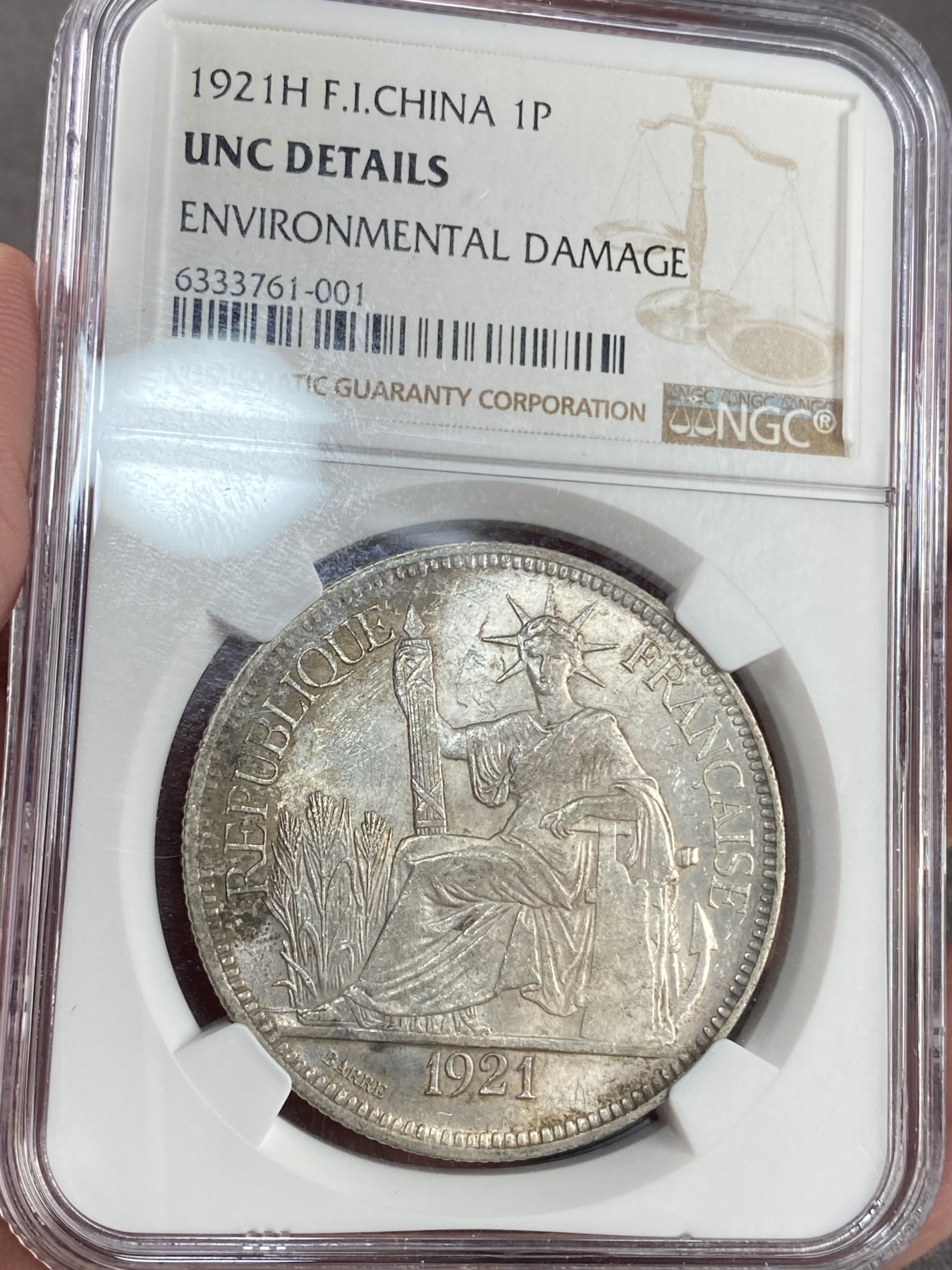 万国钱币拍卖第023期（金辉银韵之夜） NGC UNCD 1921H法属印支1皮阿斯特坐洋大银币 达到转光状态