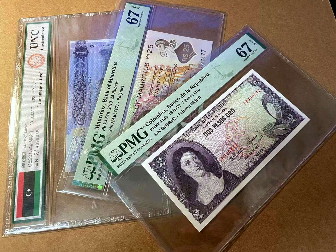 【Blue Auction】✨世界纸币精拍第461期【精】 【一组3张】哥伦比亚、毛里求斯、利比里亚评级币一组 PMG67EPQ/UNC