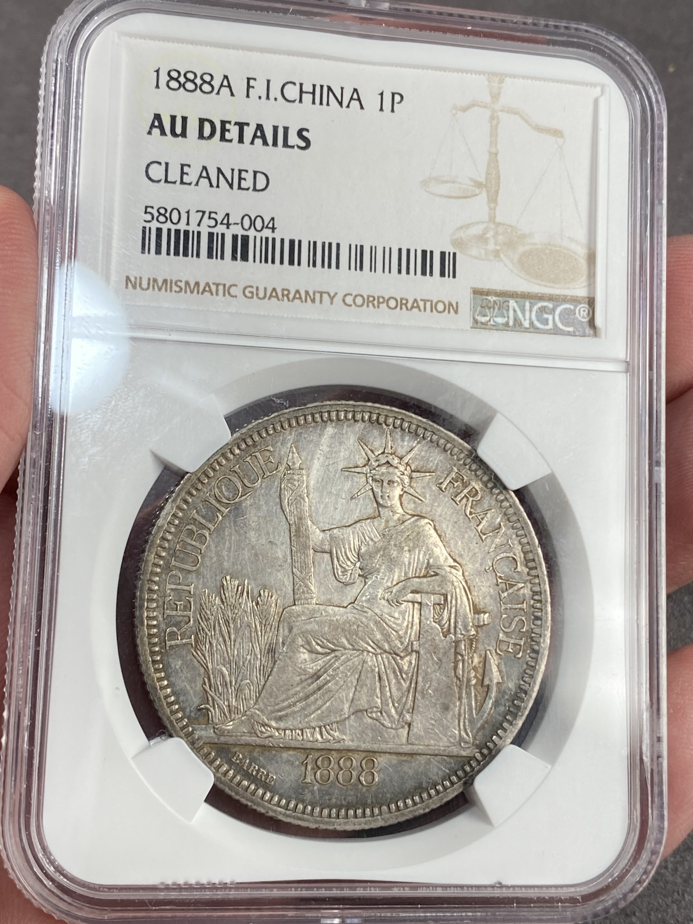 万国钱币拍卖第023期（金辉银韵之夜） NGC AUD 1888年法属印支1皮阿斯特坐洋大银币 非常难得的年份 状态也很赞