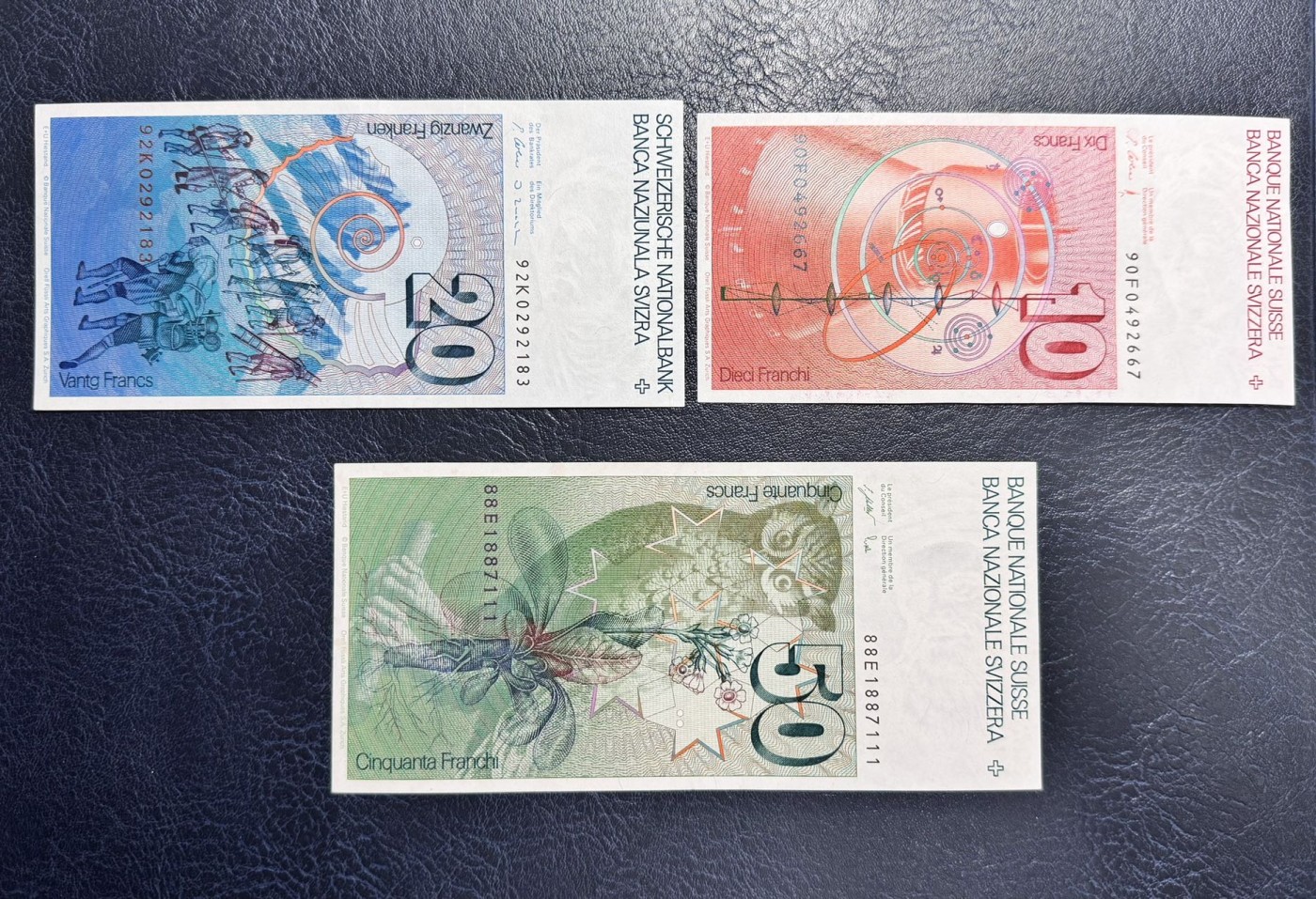 收藏联盟Quantum Auction 第337期拍卖  瑞士联邦1988-92年10-20-50法郎 品相分别为AU和UNC- 