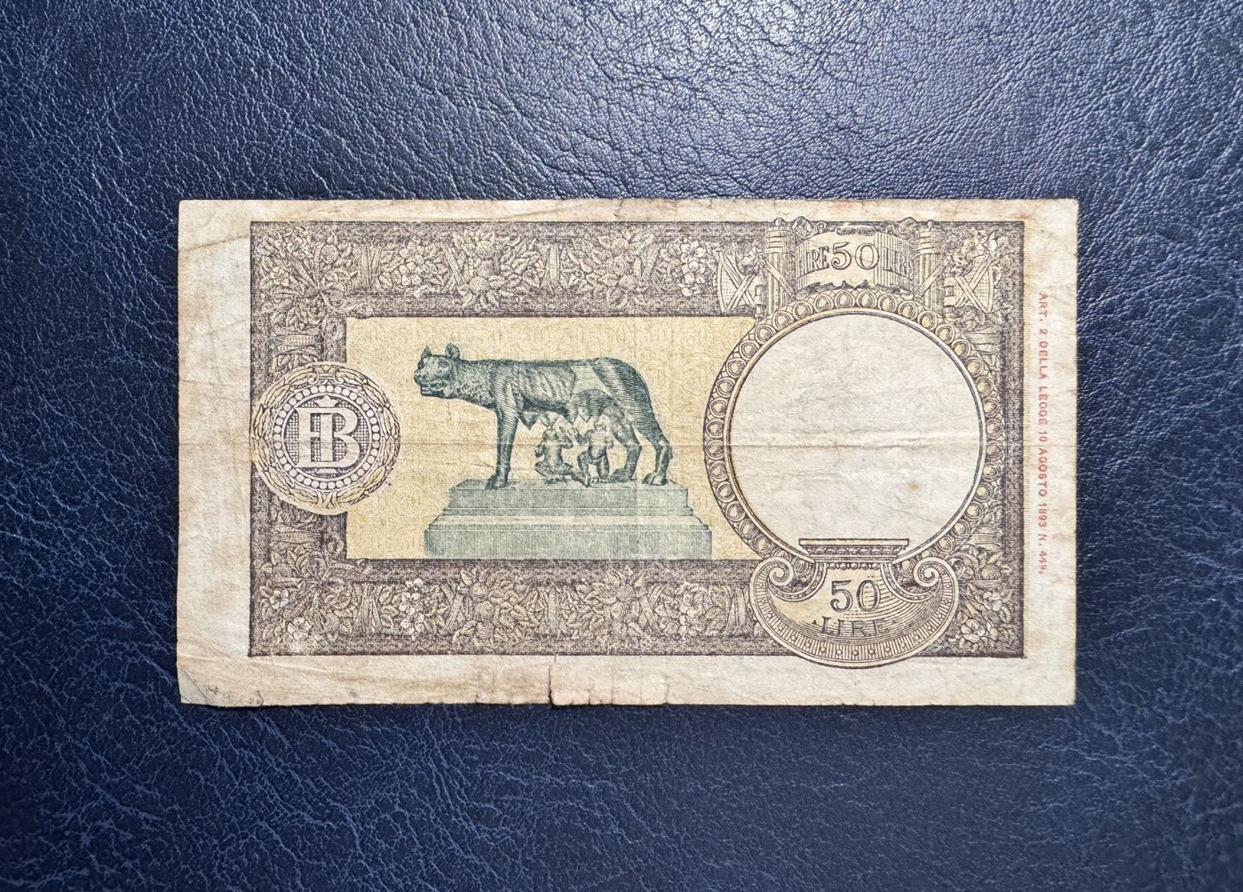 收藏联盟Quantum Auction 第337期拍卖  意大利1943年50里拉 非全新 品相如图 狼孩