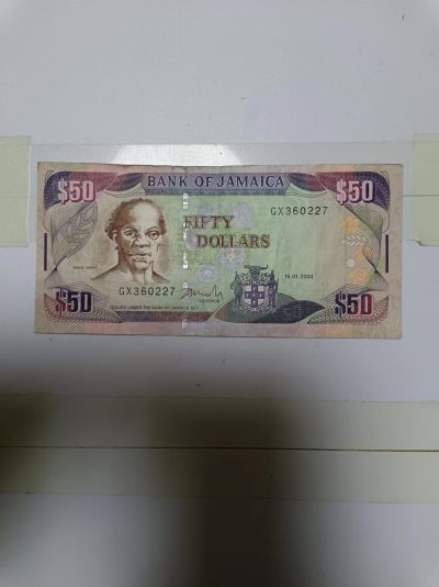 【20240414】非全新纸币第129场 - 牙买加50元，有裂缝